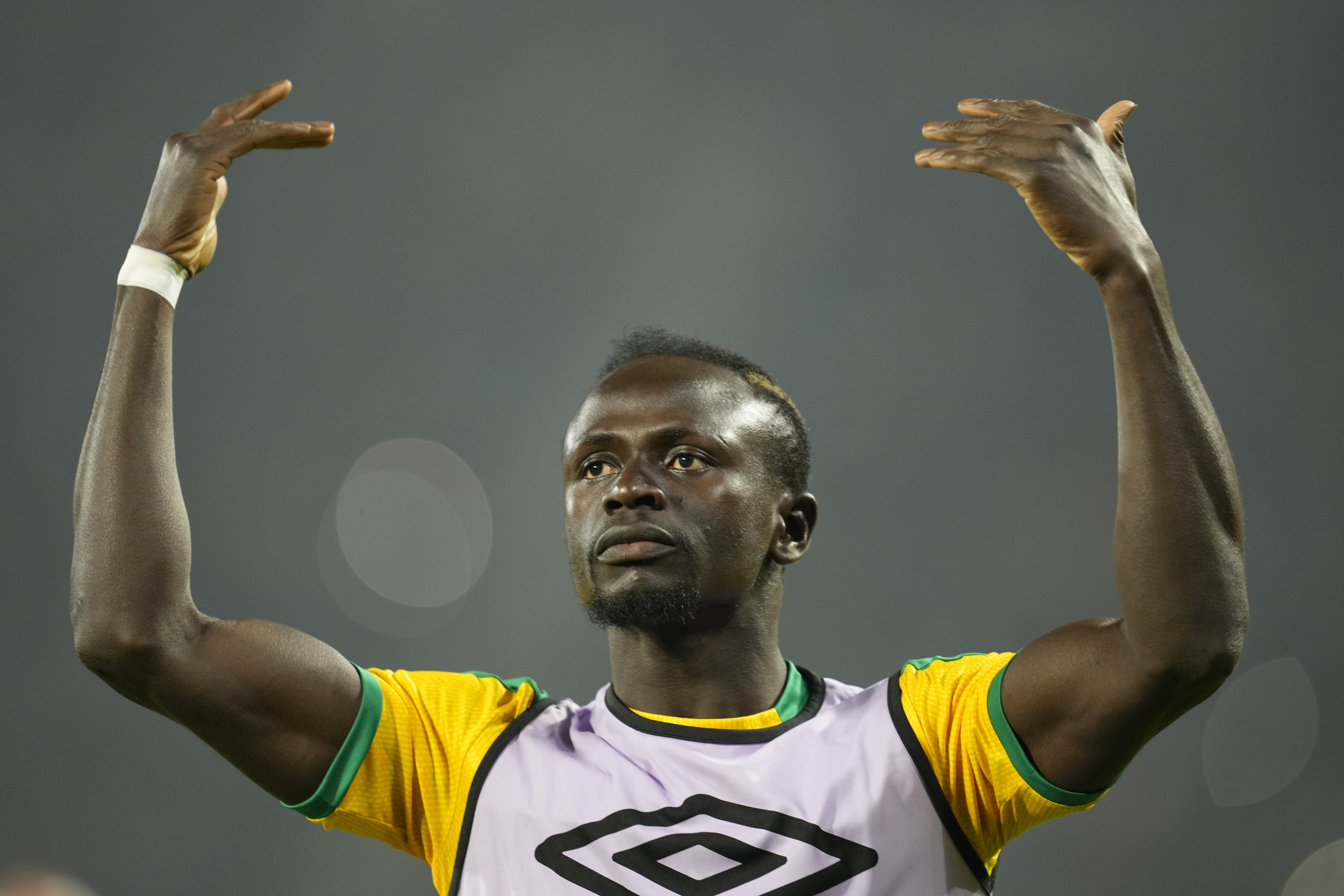 FILE- Senegal's Sadio Mane gestures prior to the start of the African Cup of Nations 2022 final soccer match between Senegal and Egypt at the Ahmadou Ahidjo stadium in Yaounde, Cameroon, on Feb. 6, 2022.