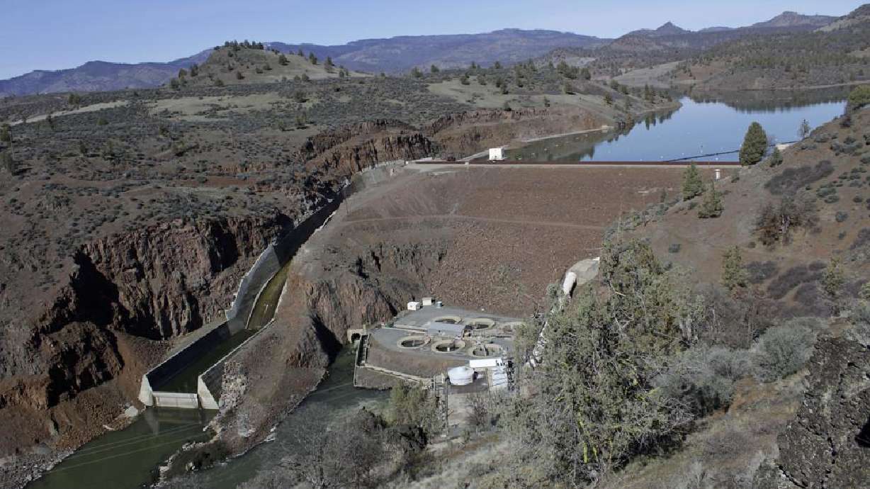 The Iron Gate Dam, powerhouse and spillway is seen on the lower Klamath River near Hornbrook, Calif, on March 3, 2020. The largest dam demolition and river restoration plan in the world could be close to reality Thursday as U.S. regulators vote on a plan to remove four aging hydro-electric structures, reopening hundreds of miles of California river habitat to imperiled salmon.