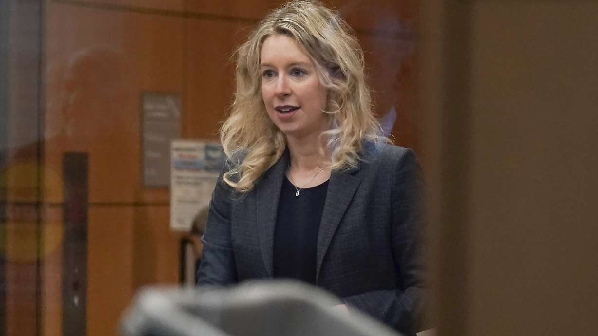 Former Theranos CEO Elizabeth Holmes arrives at federal court in San Jose, Calif., on Oct. 17. A federal judge on Friday sentenced disgraced Theranos CEO Elizabeth Holmes to more than 11 years in prison for duping investors in the failed startup that promised to revolutionize blood testing but instead made her a symbol of Silicon Valley’s culture of audacious self-promotion.