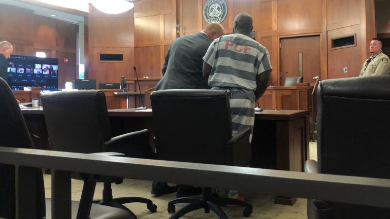 Defendant Tommy Bradshaw Jr. confers with defense attorney Ryan Stout during sentencing hearing in the 2020 shooting of Jamal Goodman, St. George, Tuesday.