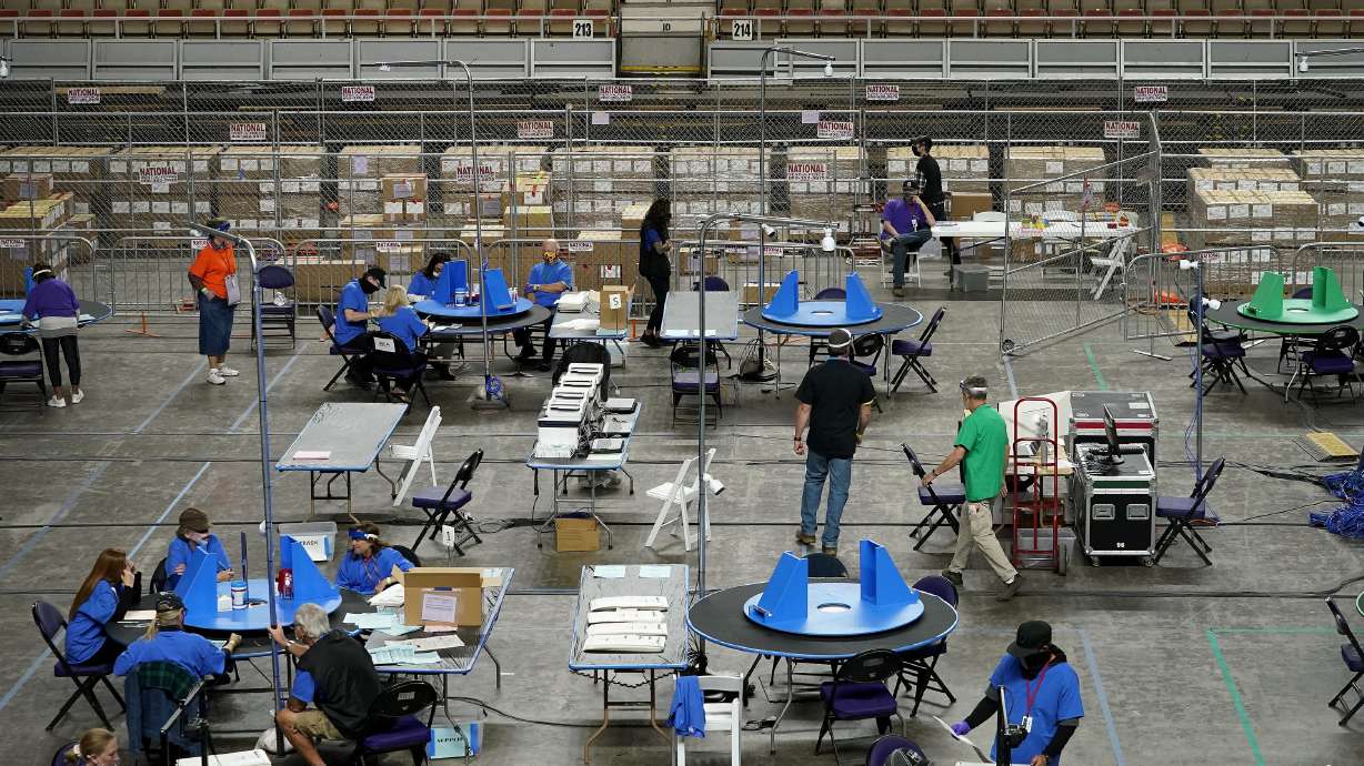 Maricopa County, Ariz., ballots cast in the 2020 general election are examined and recounted by contractors working for Florida-based company, Cyber Ninjas, in Phoenix on May 6, 2021. At least one recount will be on tap in Arizona after the counting from the Nov. 8 midterm elections ends.