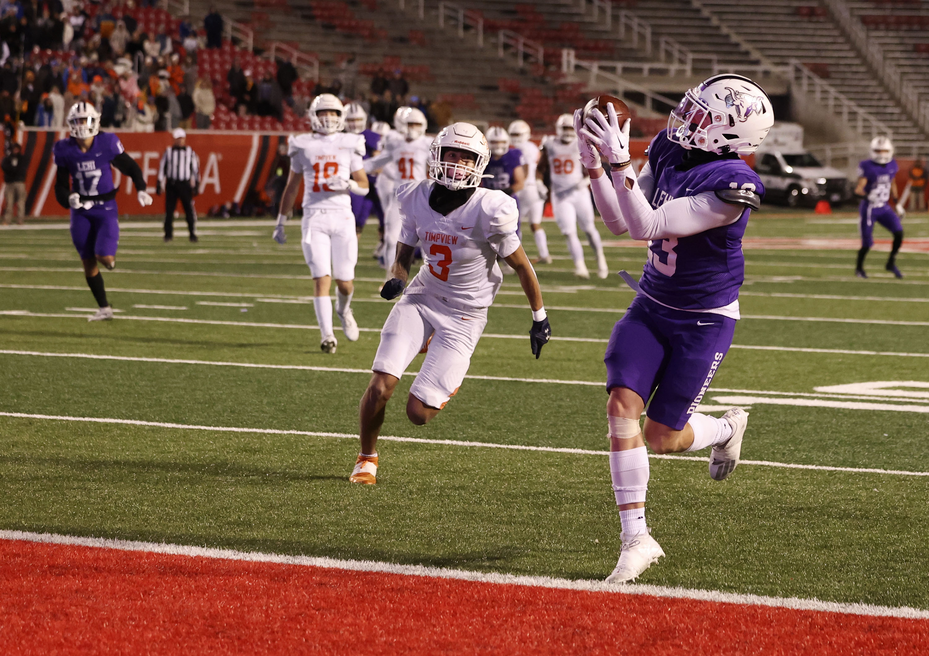Lehi’s Kolton Tanner catches a pass and scores in overtime against Timpview in the 5A state championship game at Rice-Eccles Stadium in Salt Lake City on Friday, Nov. 18, 2022.