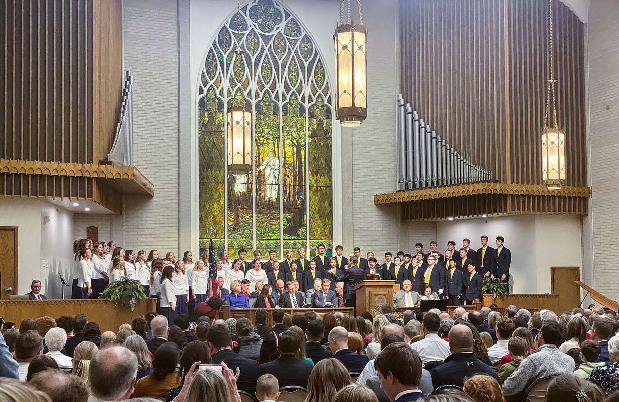 The Heritage Youth Choir sings during a dedication ceremony for a new American Heritage School campus in a former Latter-day Saint Meetinghouse, leased from The Church of Jesus Christ of Latter-day Saints, in Salt Lake City on Friday.
