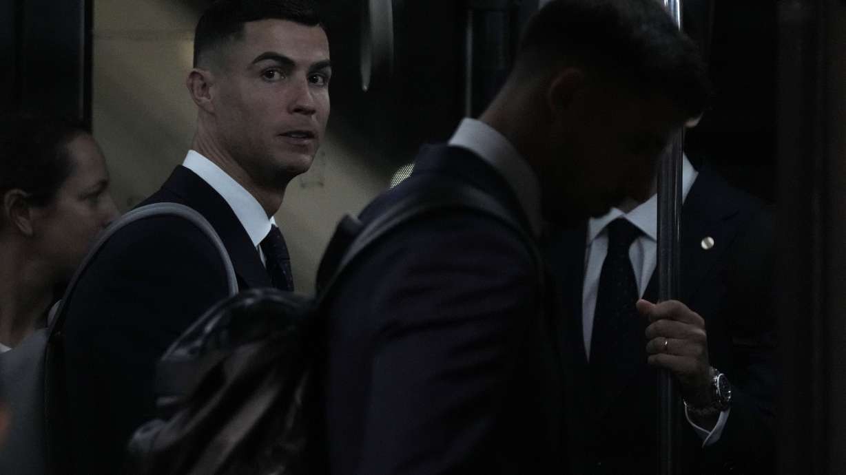 Cristiano Ronaldo of Portugal's national soccer team arrives at Hamad International airport in Doha, Qatar, Friday, Nov. 18, 2022 ahead of the upcoming World Cup. Portugal will play the first match in the World Cup against Ghana on Nov. 23.
