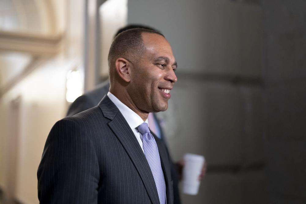 House Democratic Caucus Chair Hakeem Jeffries, D-N.Y., arrives to meet with his fellow Democrats, at the Capitol in Washington, Thursday. The day after Speaker Nancy Pelosi announced she would step aside, Jeffries announced his own history-making bid Friday to become the first Black American to helm a major U.S. political party in Congress as leader of the House Democrats.