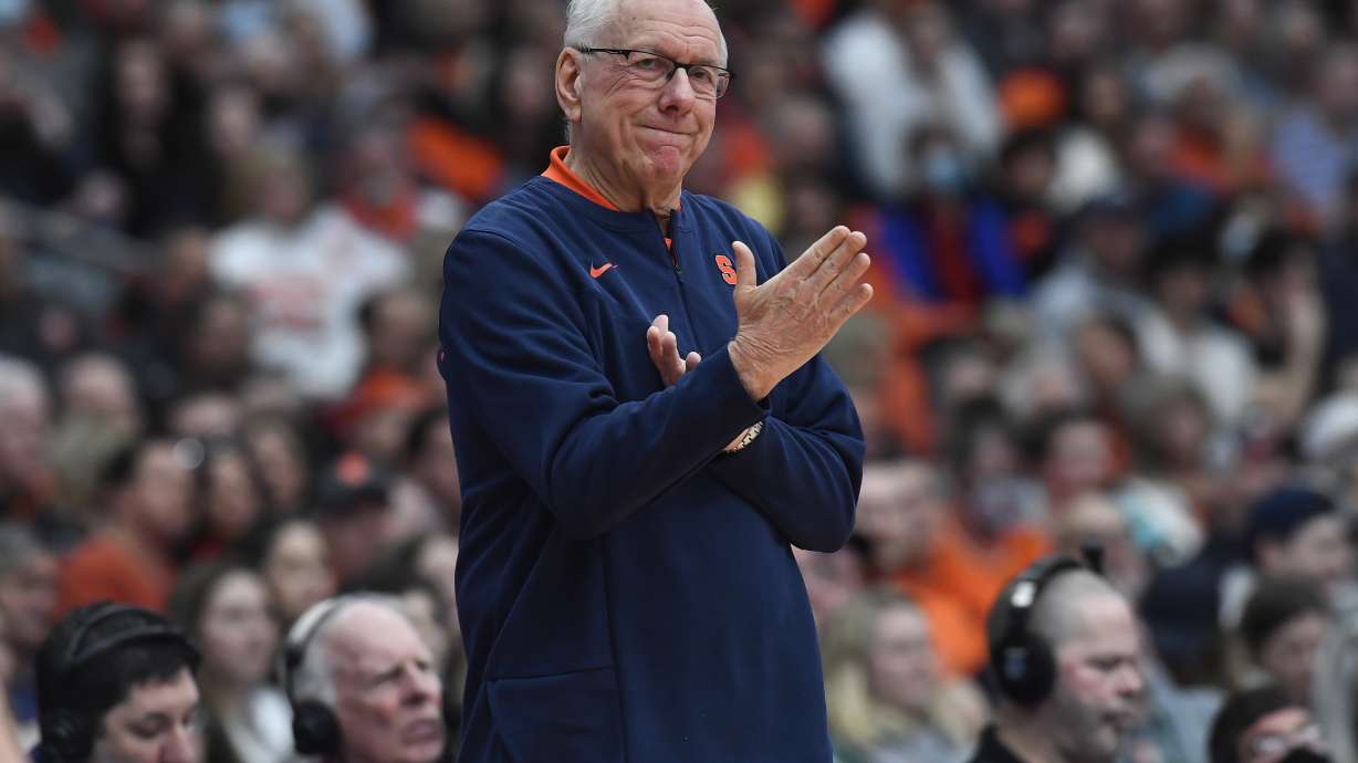 FILE - Syracuse head coach Jim Boeheim gestures during the second half of an NCAA college basketball game against Miami in Syracuse, N.Y., March 5, 2022. Joe Girard had 21 points and five 3-pointers, Jesse Edwards added 19 points and seven rebounds and Syracuse beat Northeastern 76-48 on Saturday, Nov. 19, 2022, for Boeheim's 1,000th career victory.
