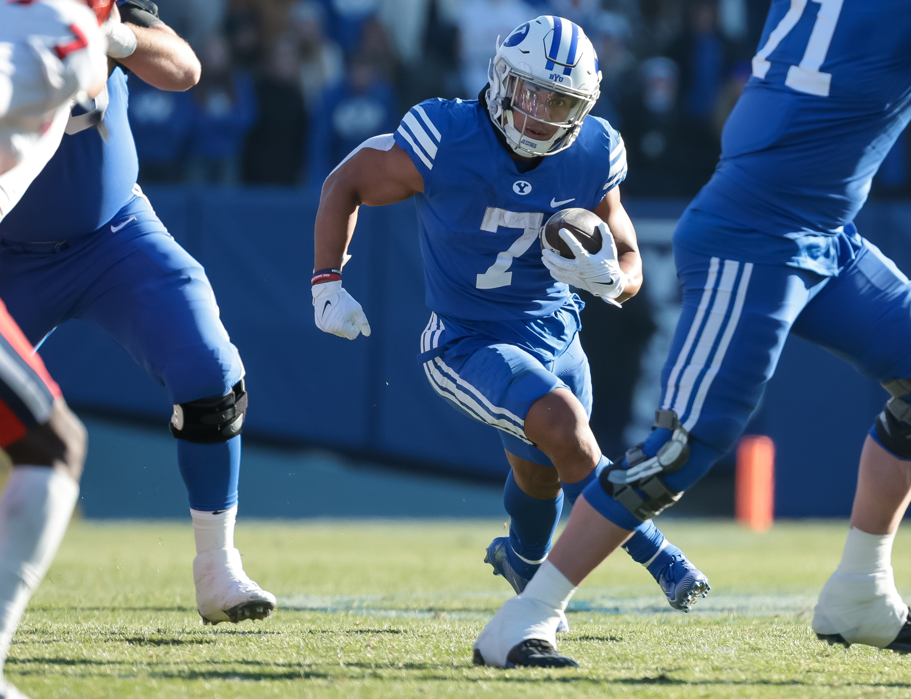 BYU running back Hinckley Ropati (7) runs the ball during the game against the Utah Tech Trailblazers at LaVell Edwards Stadium in Provo on Saturday, Nov. 19, 2022.