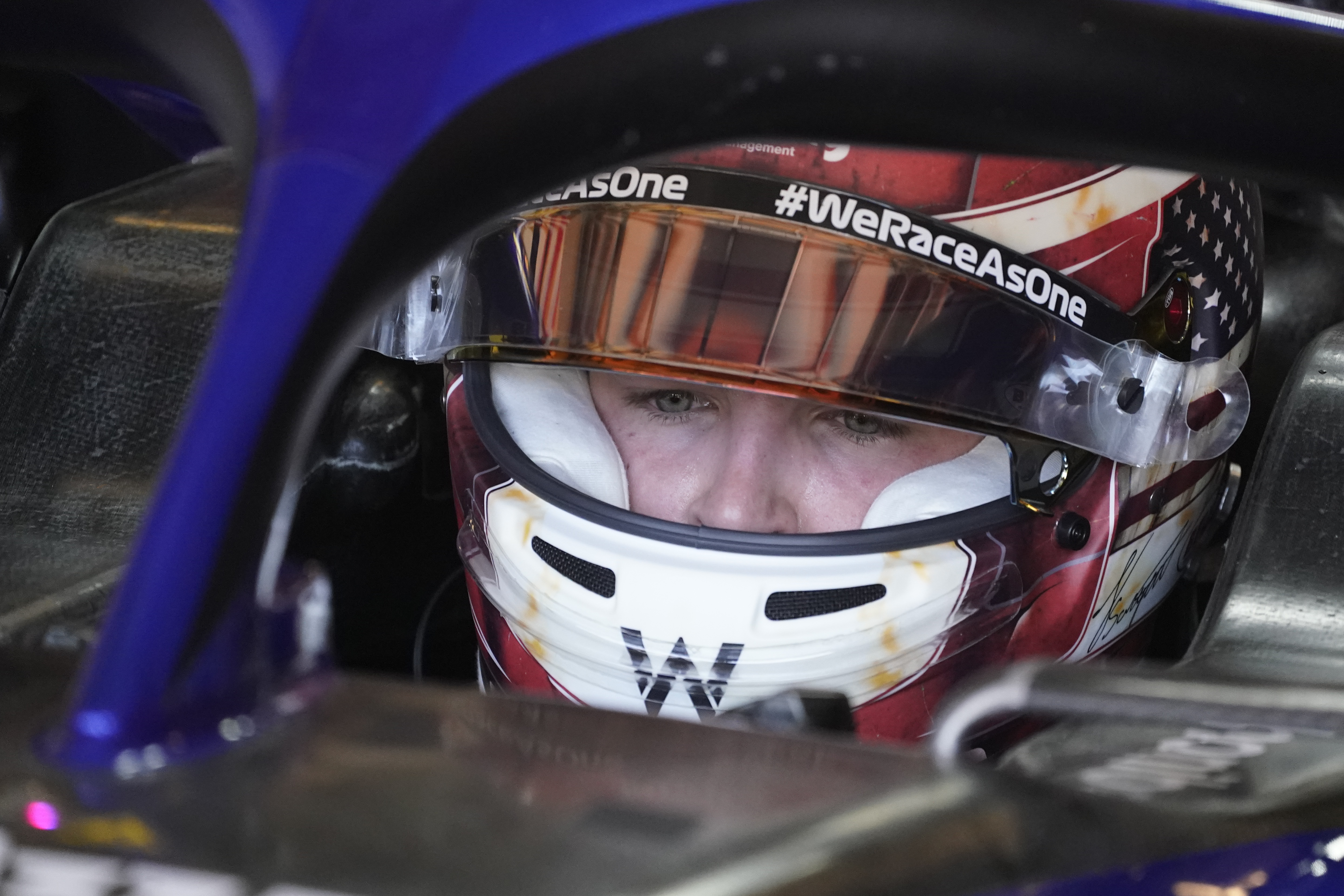 Williams test driver Logan Sargeant sits in his car during the first practice session for the Formula One U.S. Grand Prix auto race at Circuit of the Americas, Friday, Oct. 21, 2022, in Austin, Texas. 