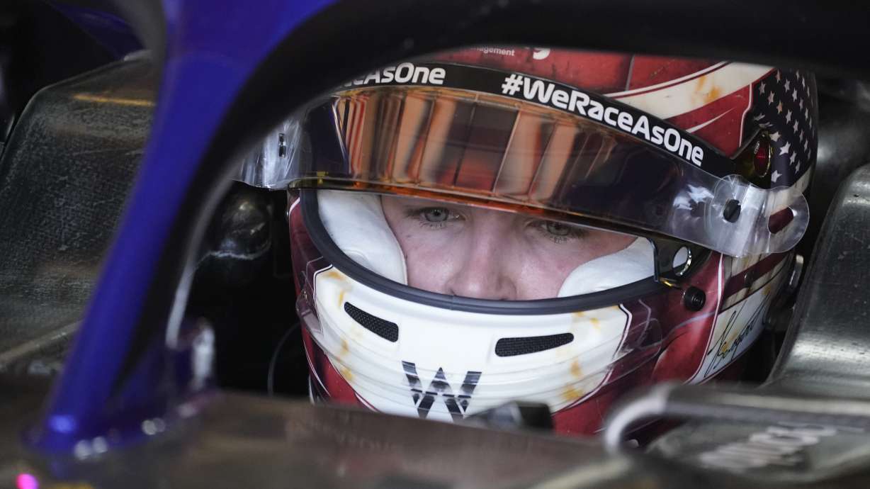 Williams test driver Logan Sargeant sits in his car during the first practice session for the Formula One U.S. Grand Prix auto race at Circuit of the Americas, Friday, Oct. 21, 2022, in Austin, Texas.