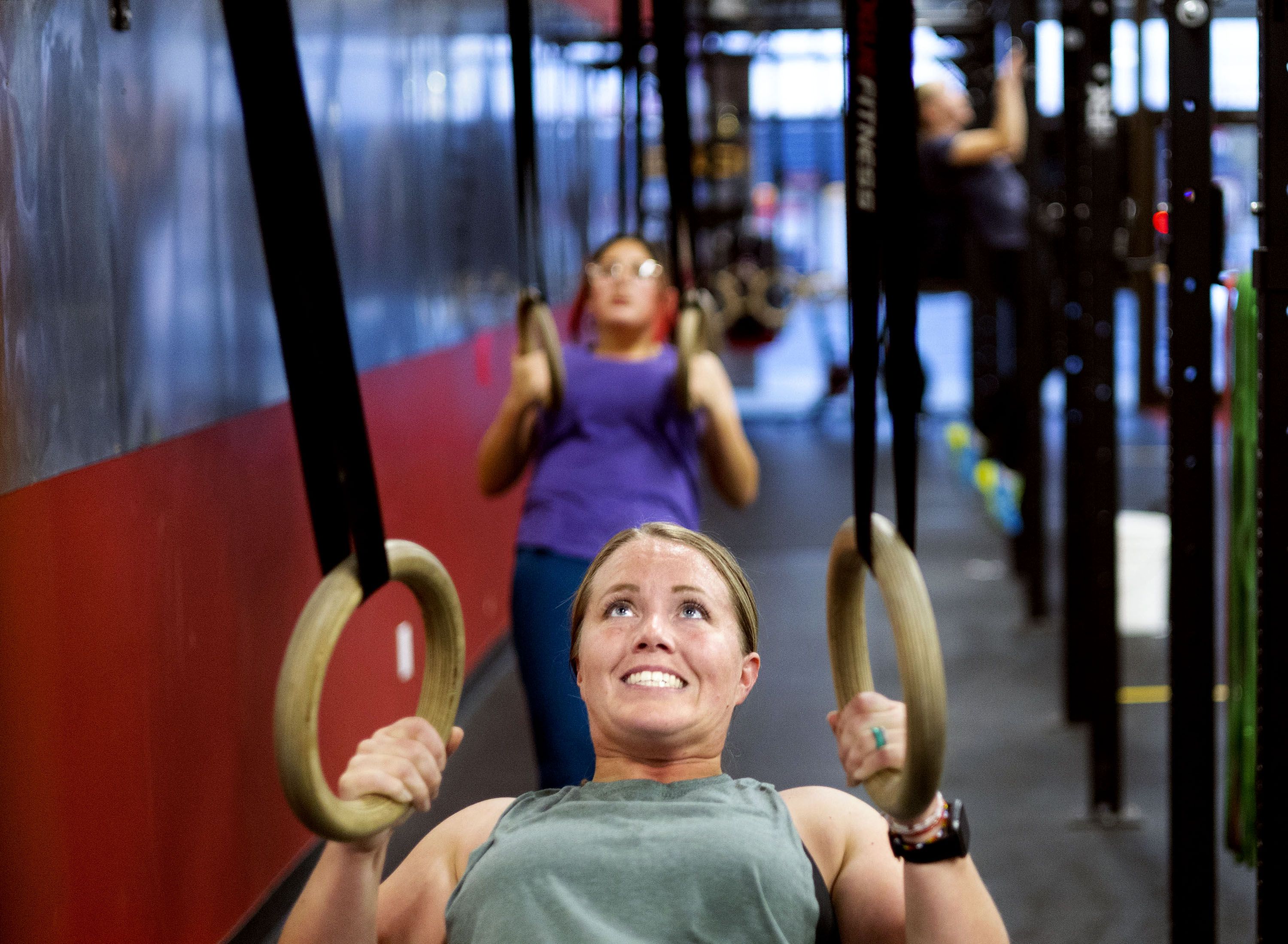 Jody Reid, a mother of three who reversed her Type 2 diabetes through exercise and diet, participates in a fitness class at Roy CrossFit in Roy on Nov. 9.
