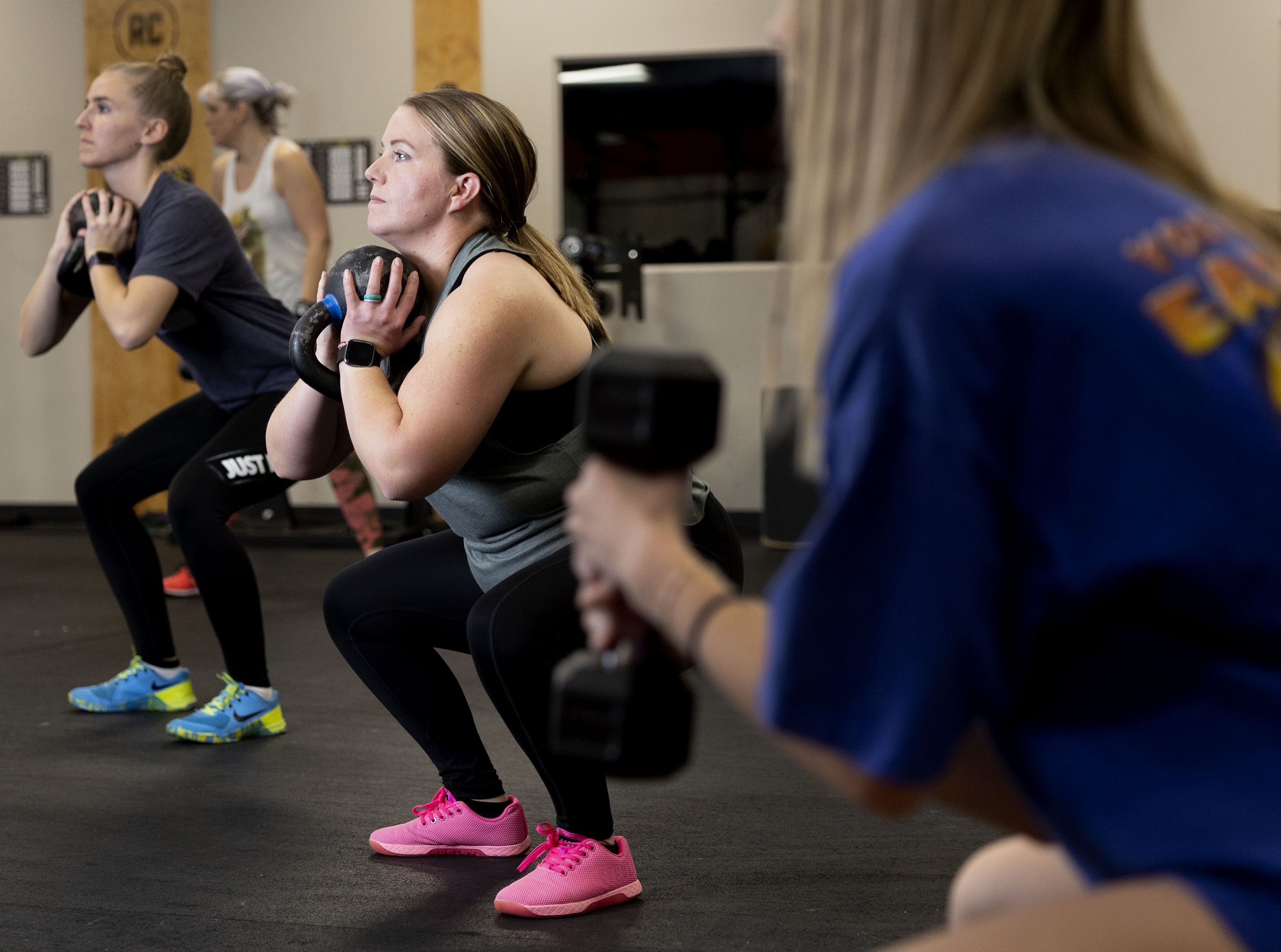 Jody Reid, a mother of three who reversed her Type 2 diabetes through exercise and diet, participates in a fitness class at Roy CrossFit in Roy on Nov. 9.