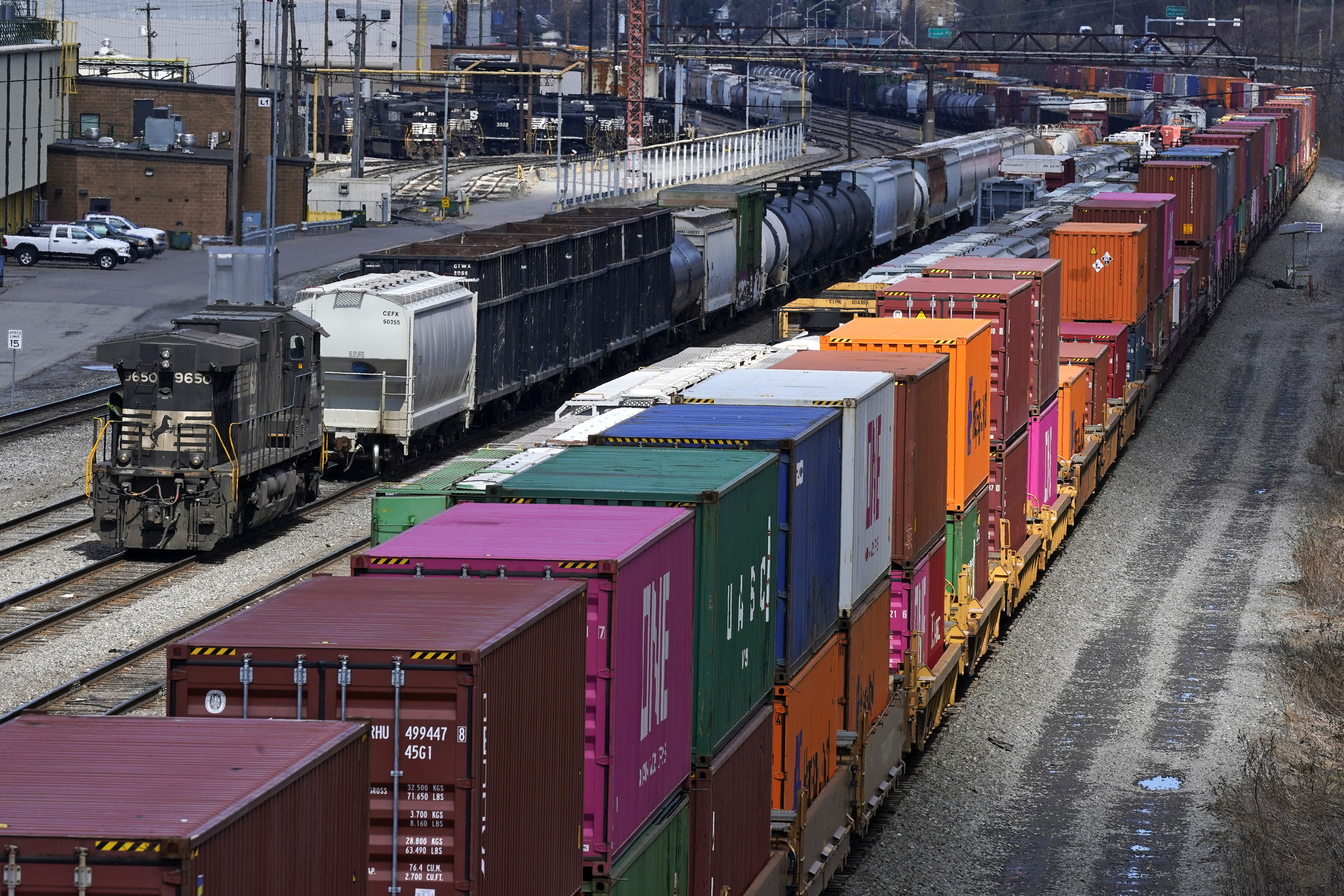 Freight train cars and containers at Norfolk Southern Railroad's Conway Yard in Conway, Pa., on April 2, 2021. Railroad engineers Monday accepted their deal with the railroads that will deliver 24% raises but conductors rejected the contract. 