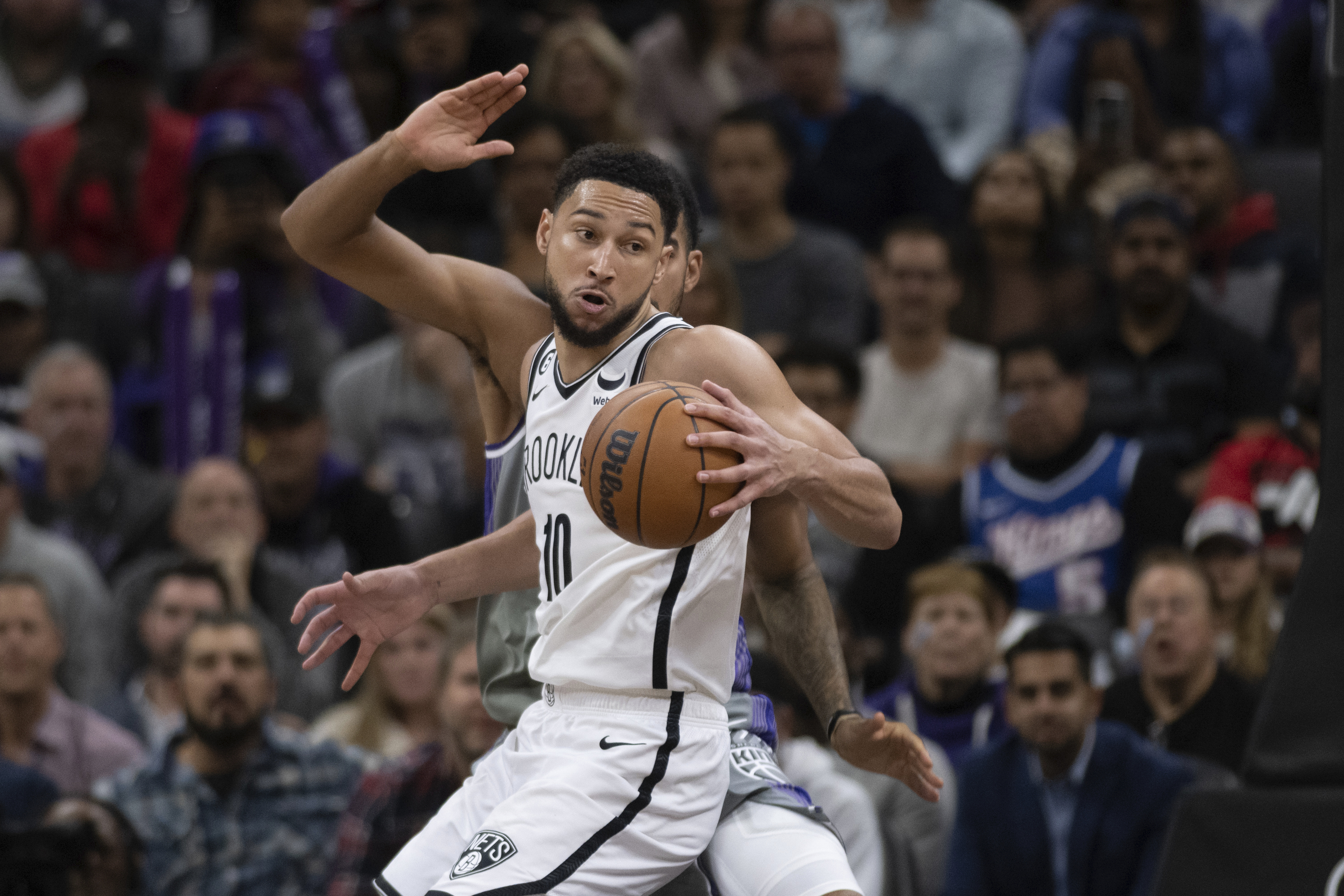Brooklyn Nets guard Ben Simmons (10) makes a spin move in the key in the second half of an NBA basketball game against the Sacramento Kings in Sacramento, Calif., Tuesday, Nov. 15, 2022. The Kings won 153-121. 