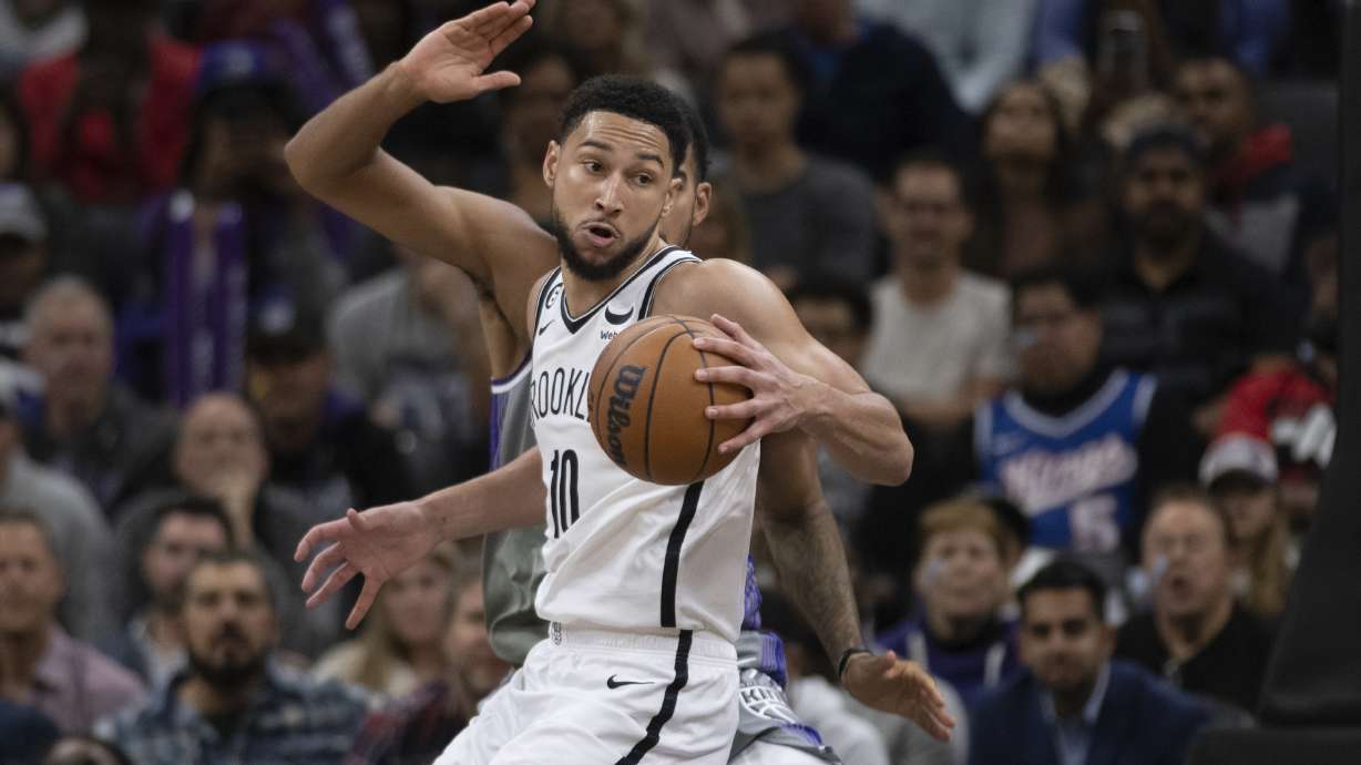 Brooklyn Nets guard Ben Simmons (10) makes a spin move in the key in the second half of an NBA basketball game against the Sacramento Kings in Sacramento, Calif., Tuesday, Nov. 15, 2022. The Kings won 153-121.