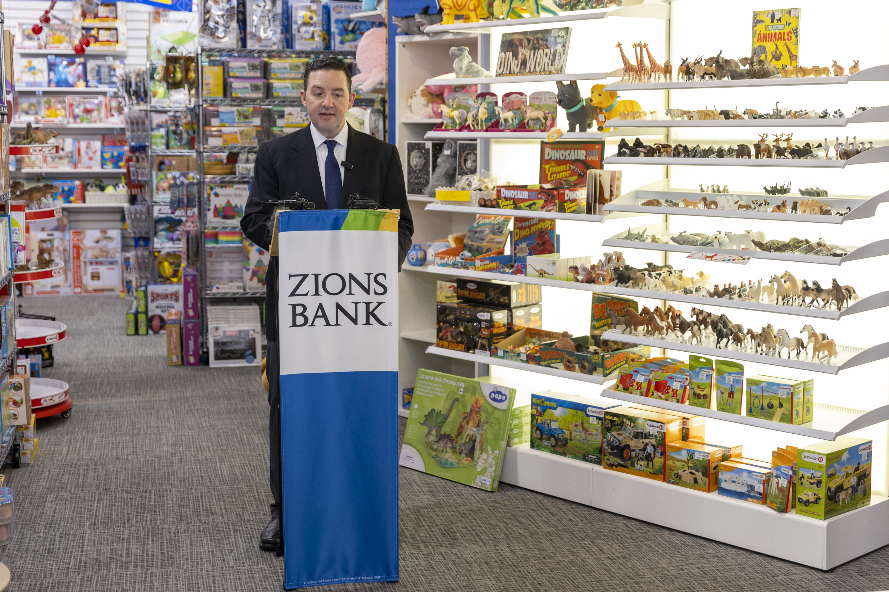 Robert Spendlove, Zions Bank senior economist, speaks to the media at the Tutoring Toy store in Salt Lake City on Monday.