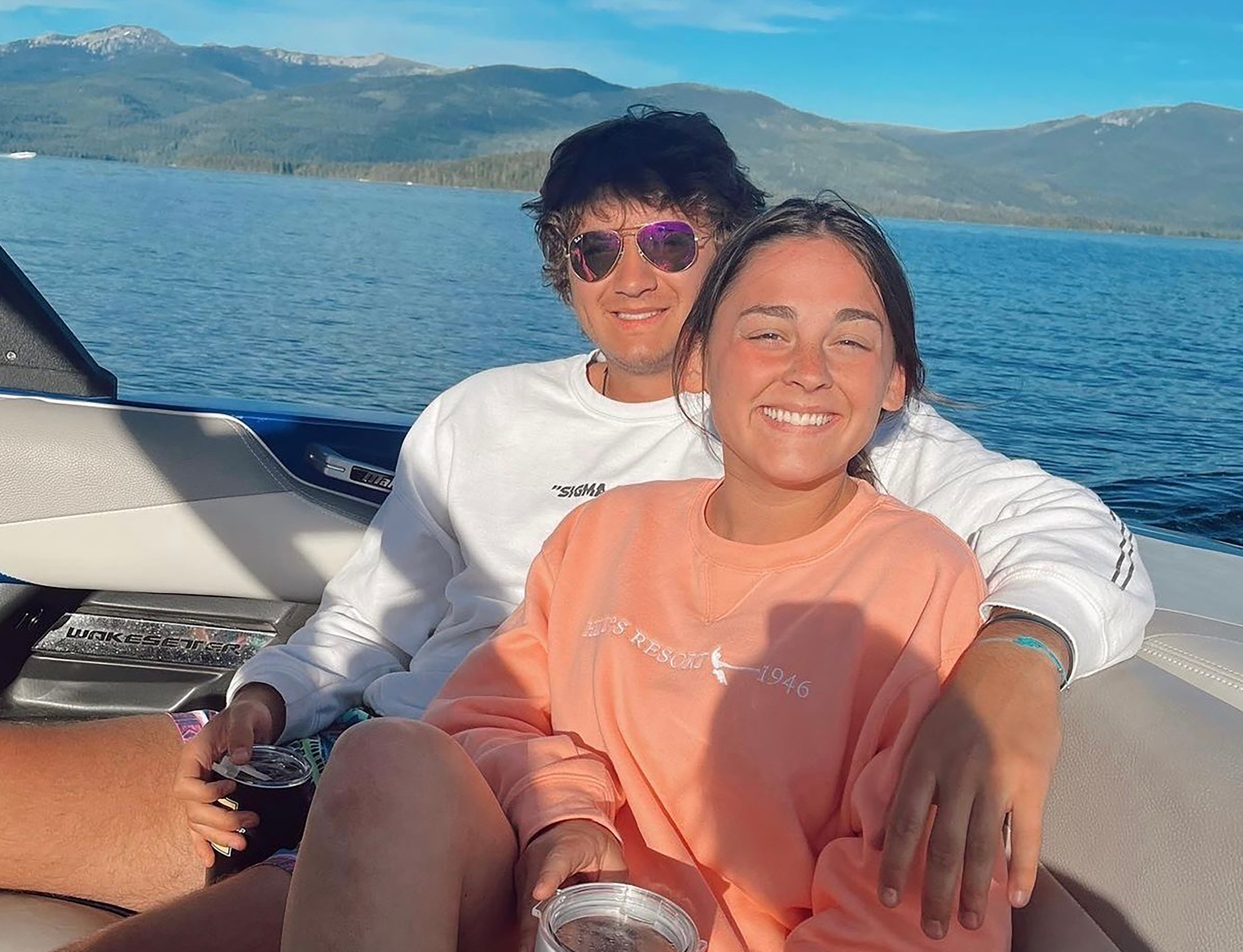 This July photo provided by Jazzmin Kernodle shows University of Idaho students Xana Kernodle, right, and Ethan Chapin on a boat on Priest Lake, in Idaho. Both students were among four found stabbed to death in an off-campus rental home on Nov. 13.