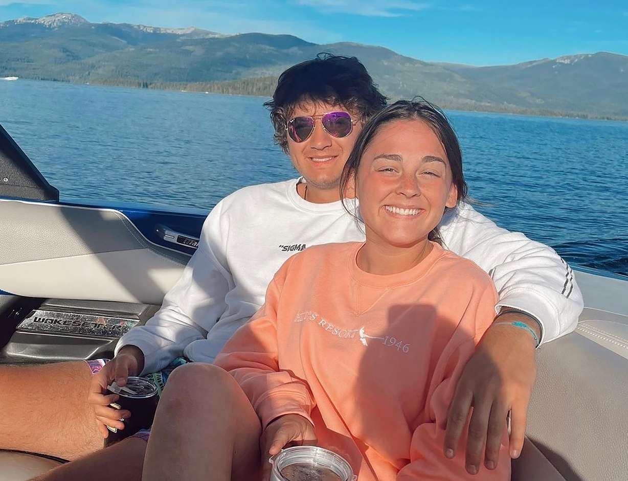 This July photo provided by Jazzmin Kernodle shows University of Idaho students Xana Kernodle, right, and Ethan Chapin on a boat on Priest Lake, in Idaho. Both students were among four found stabbed to death in an off-campus rental home on Nov. 13.