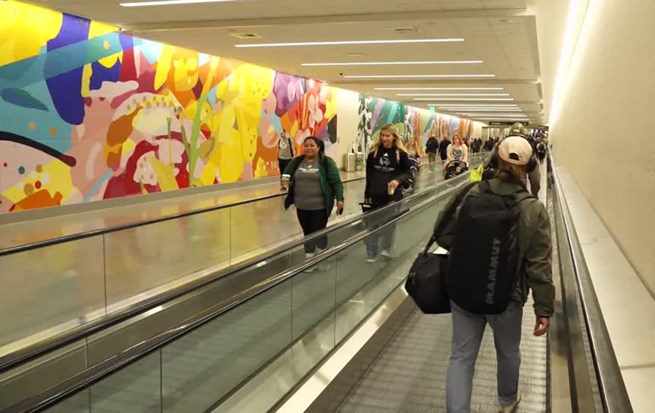 People walk to their gates at Salt Lake City International Airport. The walk to the B gates is not the longest compared to other airports KSL checked.