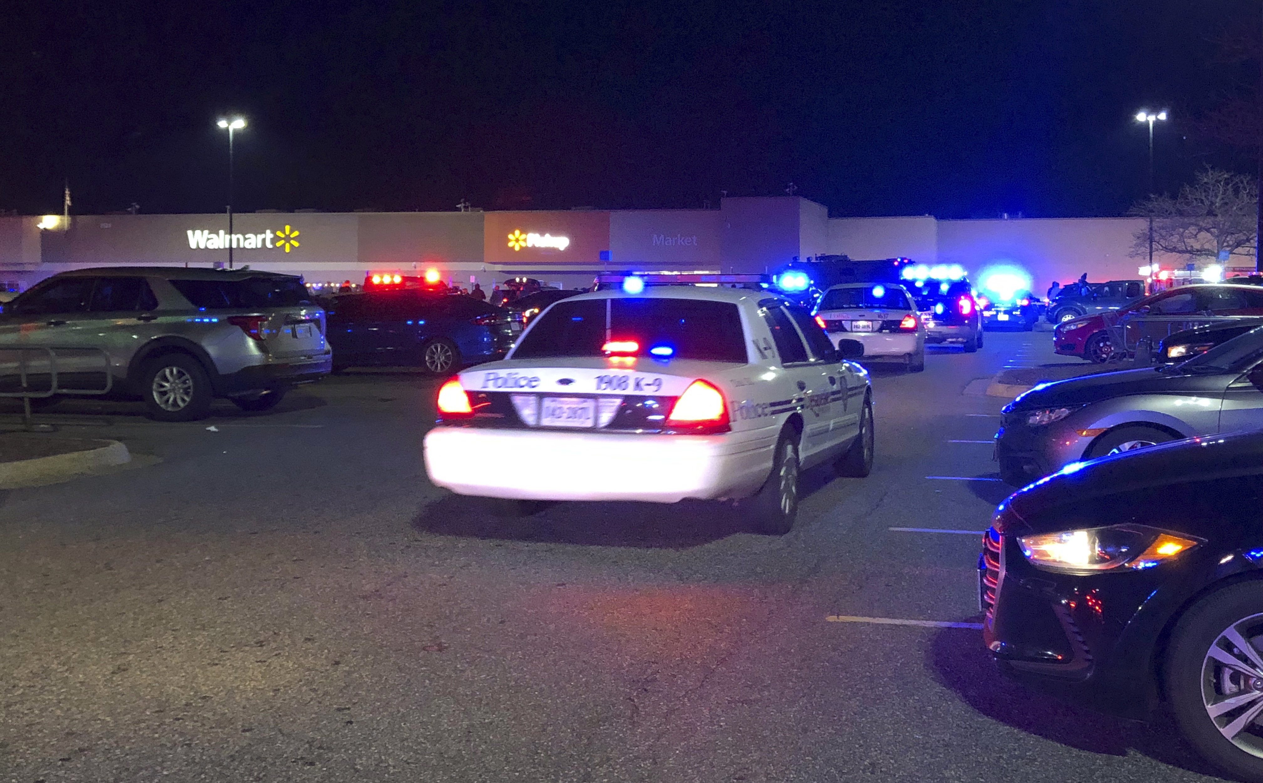 In this image from video, Virginia police respond to the scene of a fatal shooting at a Walmart on Tuesday night in Chesapeake, Va.