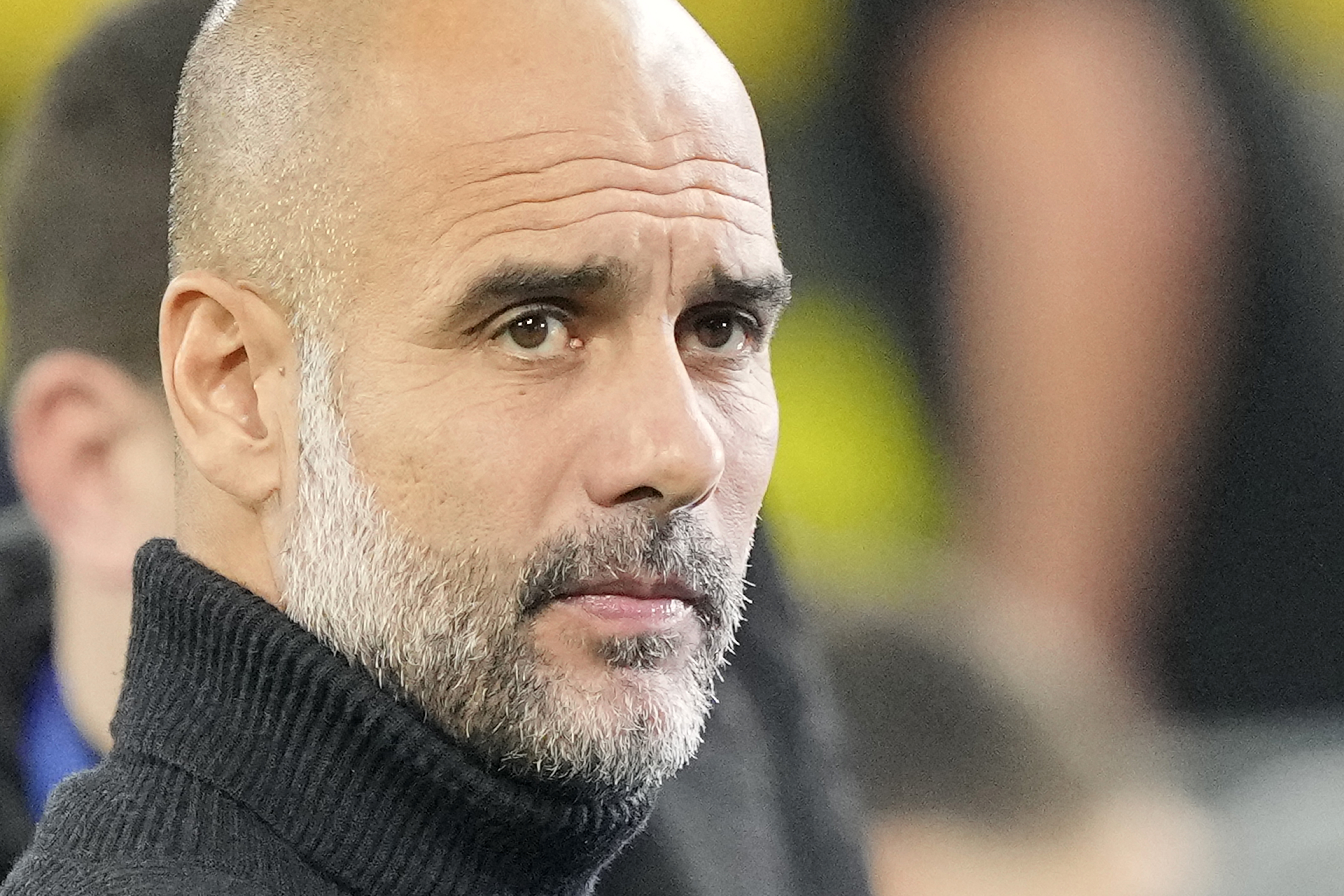 Manchester City's head coach Pep Guardiola gestures prior to the Champions League Group G soccer match between Borussia Dortmund and Manchester City in Dortmund, Germany, Tuesday, Oct. 25, 2022.