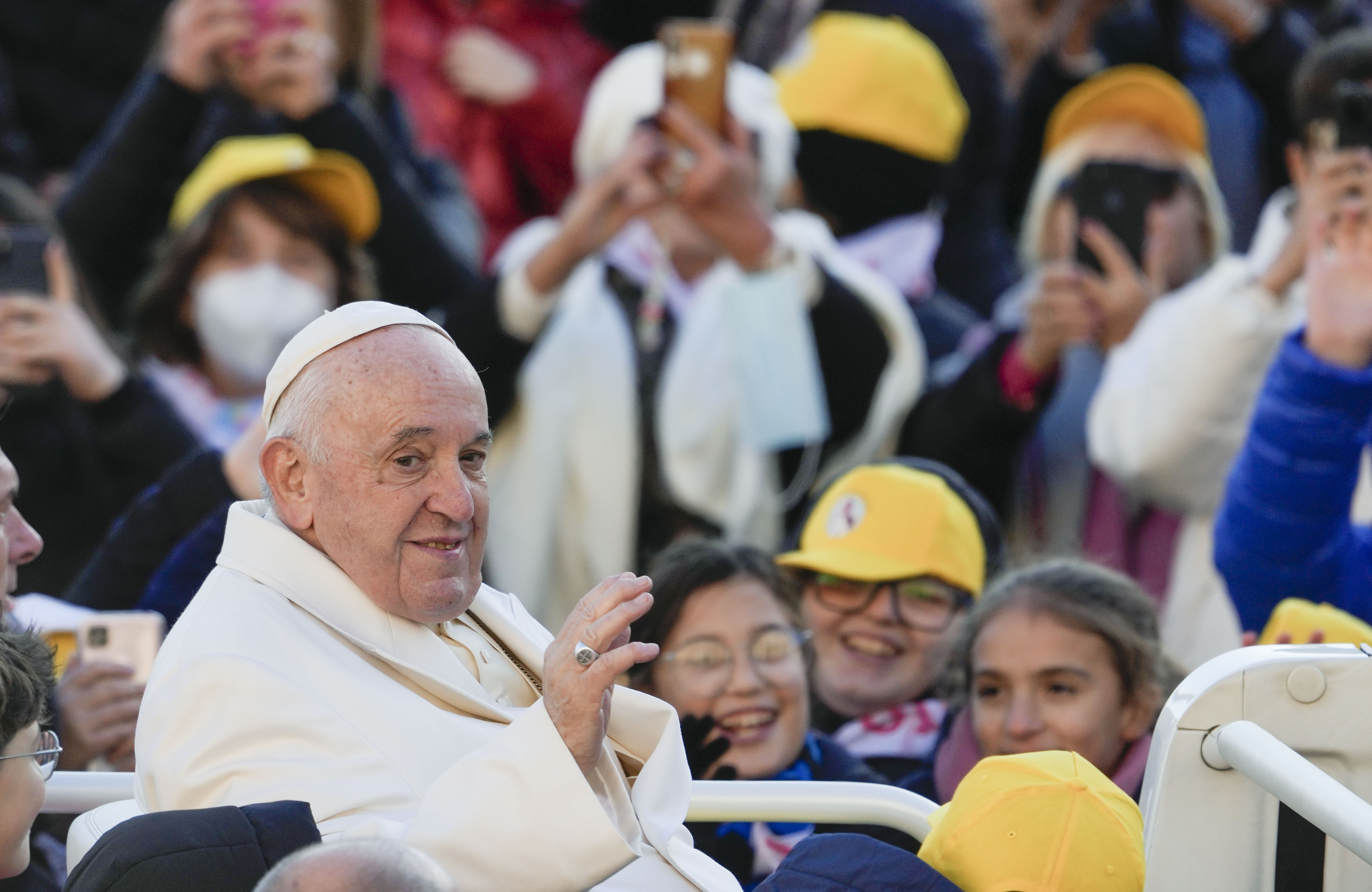 Pope Francis arrives for his weekly general audience in St. Peter's Square at The Vatican, Wednesday, Nov. 23, 2022. 