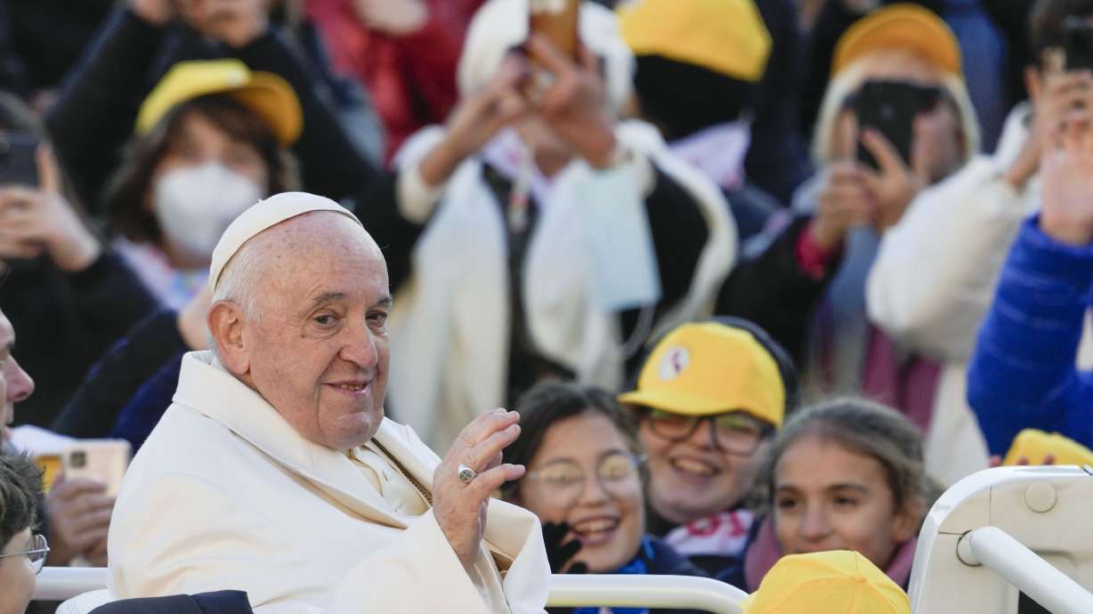 Pope Francis arrives for his weekly general audience in St. Peter's Square at The Vatican, Wednesday, Nov. 23, 2022.