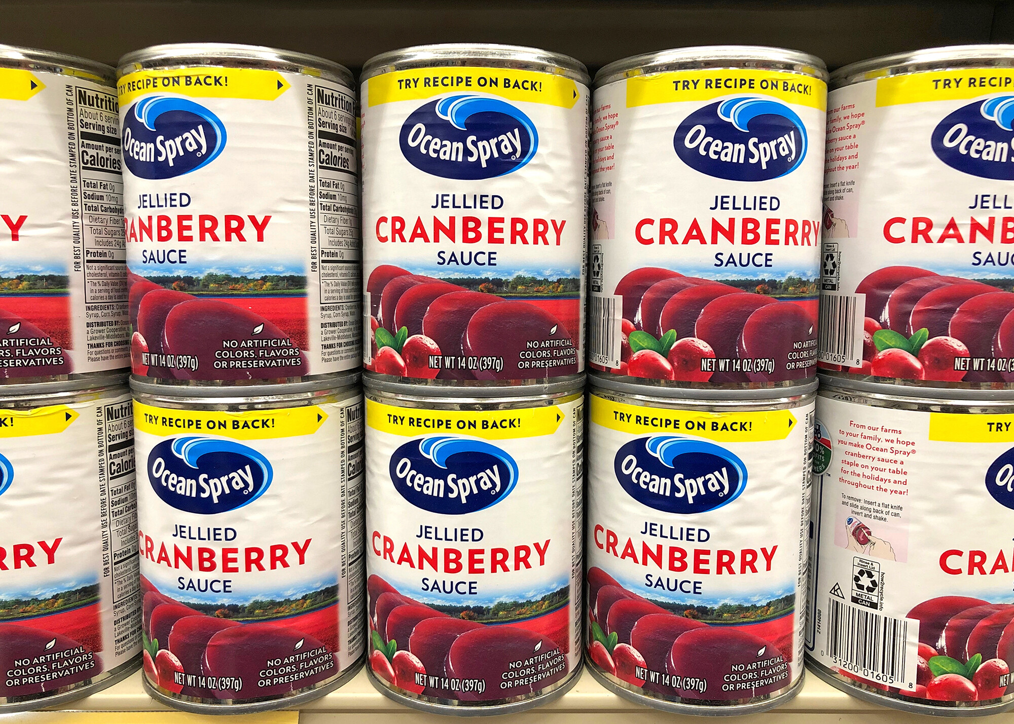 What's the deal with the upside-down labels on Ocean Spray cans? Pictured are cans of Ocean Spray brand Jellied Cranberry Sauce in Alameda, California in November 2020.