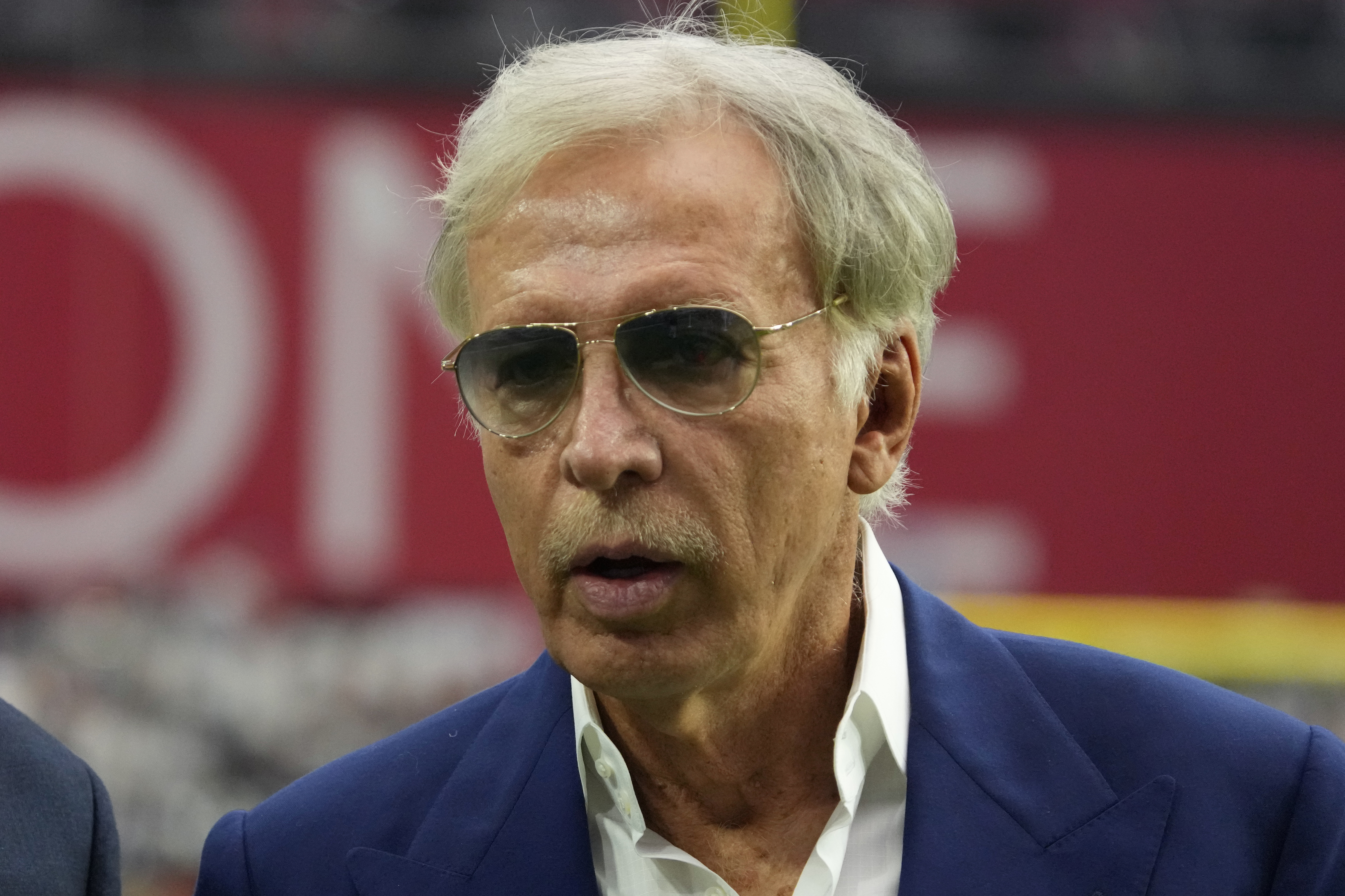 FILE - Los Angeles Rams owner Stan Kroenke is shown before an NFL football game between the Arizona Cardinals and the Los Angeles Rams, Sunday, Sept. 25, 2022, in Glendale, Ariz. Representatives of St. Louis, St. Louis County and the authority that owns The Dome at America’s Center have reached a tentative agreement dividing up the $519 million remaining in settlement money from the lawsuit over the NFL Rams’ relocation.