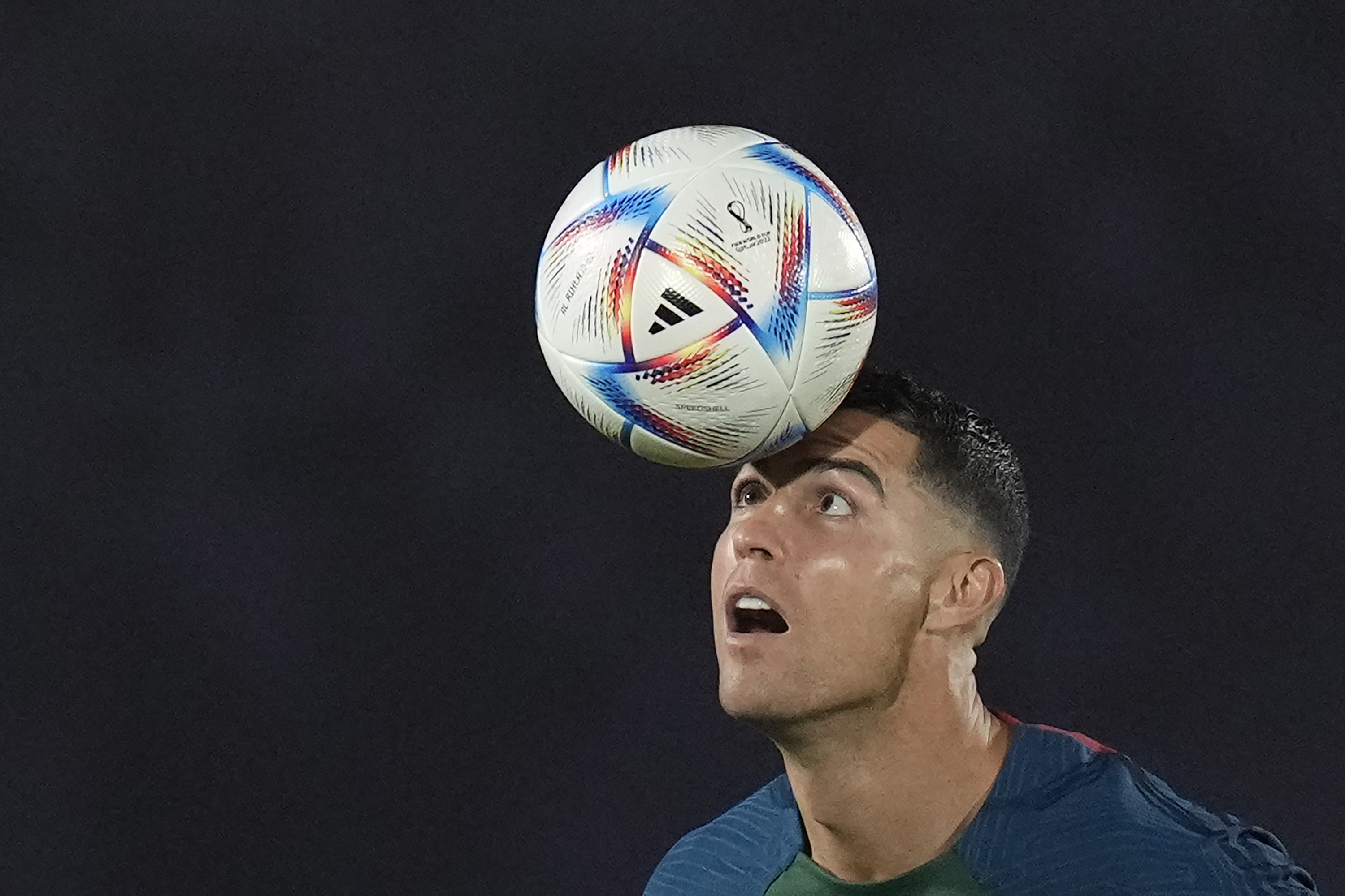 Portugal's Cristiano Ronaldo controls a ball during the Portugal's official training on the eve of the group H World Cup soccer match between Portugal and Ghana at the Al Shahaniya SC training site in Al Shahaniya, Qatar, Wednesday, Nov. 23, 2022. 