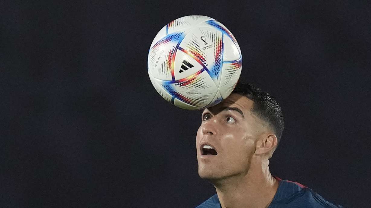 Portugal's Cristiano Ronaldo controls a ball during the Portugal's official training on the eve of the group H World Cup soccer match between Portugal and Ghana at the Al Shahaniya SC training site in Al Shahaniya, Qatar, Wednesday, Nov. 23, 2022.