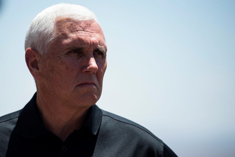 Former U.S. Vice President Mike Pence tours the U.S.-Mexico border in Cochise County south of Sierra Vista, Arizona, June 13. The U.S. Justice Department is seeking to question Pence in Jan. 6 probe. 