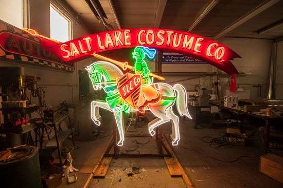 The Salt Lake Costume Company sign sits in the Rainbow Neon Sign Company shop on Saturday, Dec. 21, 2019, after a recent repair job. The sign was originally built in the 1950s and became an iconic sign within the Sugar House neighborhood.