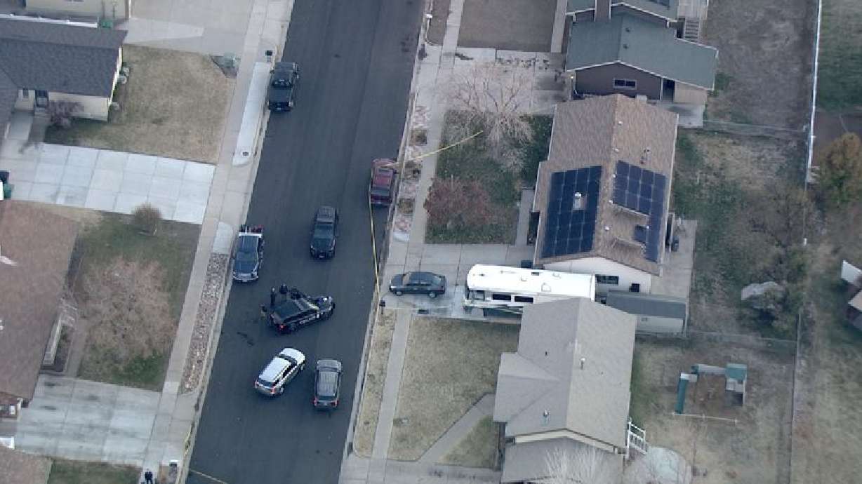 Police investigate at a home near 750 North and 1050 West in Clearfield where an 87-year-old man and his 85-year-old wife were found dead on Wednesday. Police say the couple's 26-year-old grandson admitted to violently attacking the couple in their garage on Wednesday.