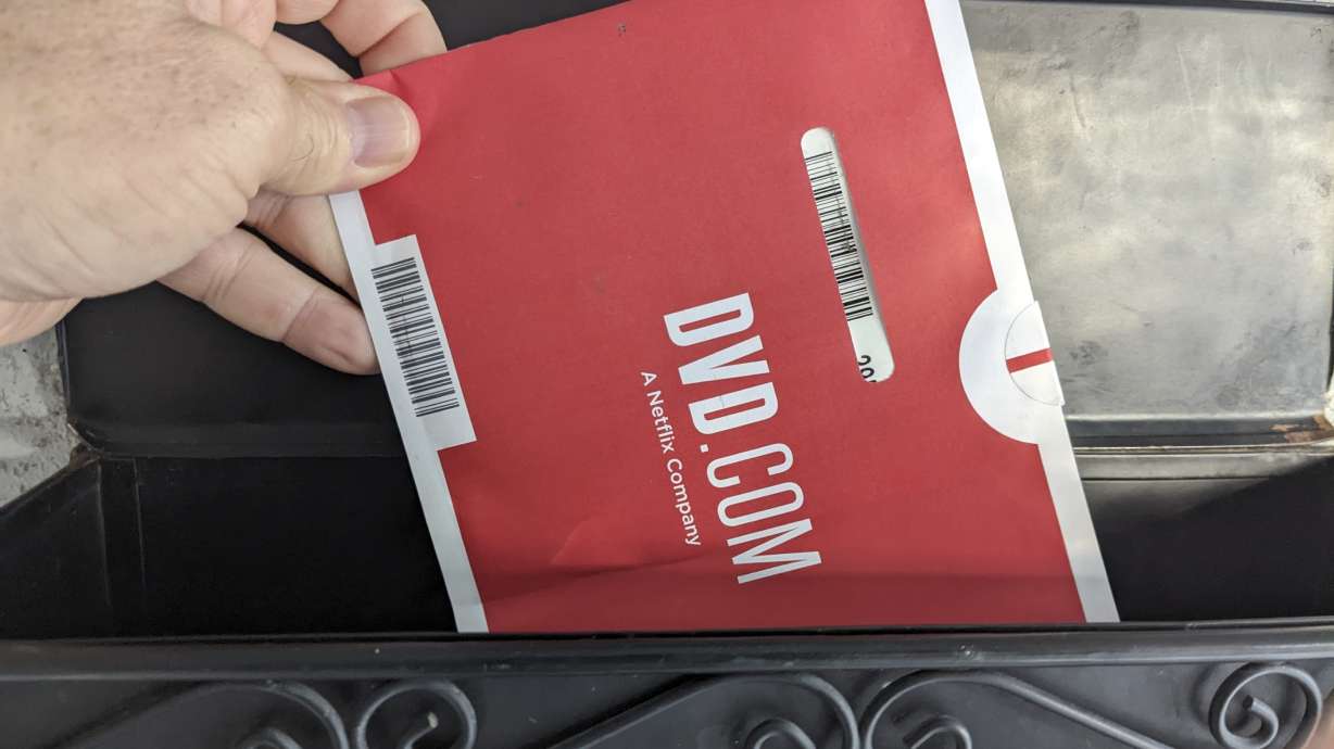 A Netflix DVD envelope is shown on Nov. 17 in San Francisco. Subscribers to Netflix’s DVD-by-mail service still look forward to opening up their mailbox and finding one of the discs delivered in the familiar red-and-white envelopes.