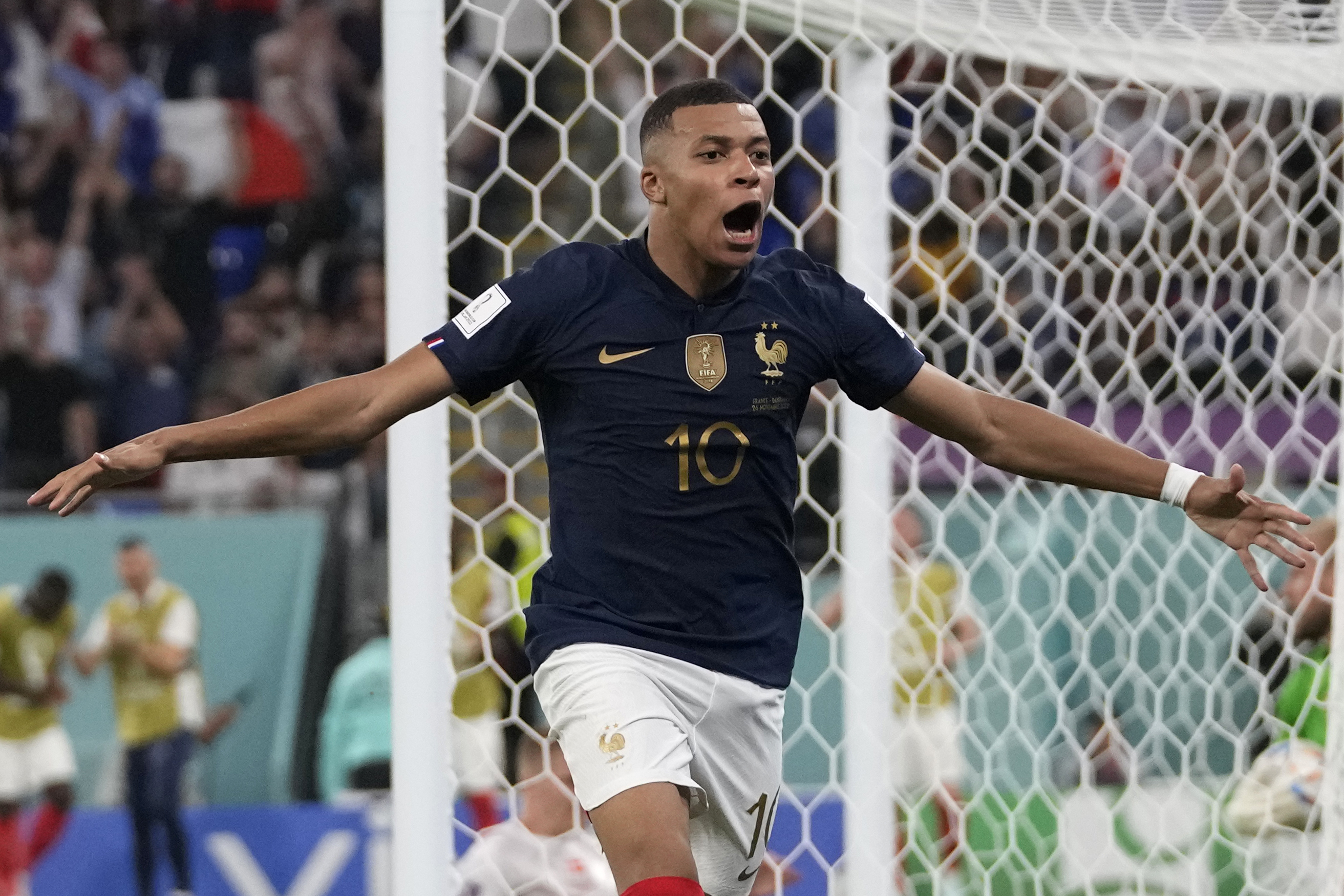 France's Kylian Mbappe celebrates after scoring his sides second goal during the World Cup group D soccer match between France and Denmark, at the Stadium 974 in Doha, Qatar, Saturday, Nov. 26, 2022.