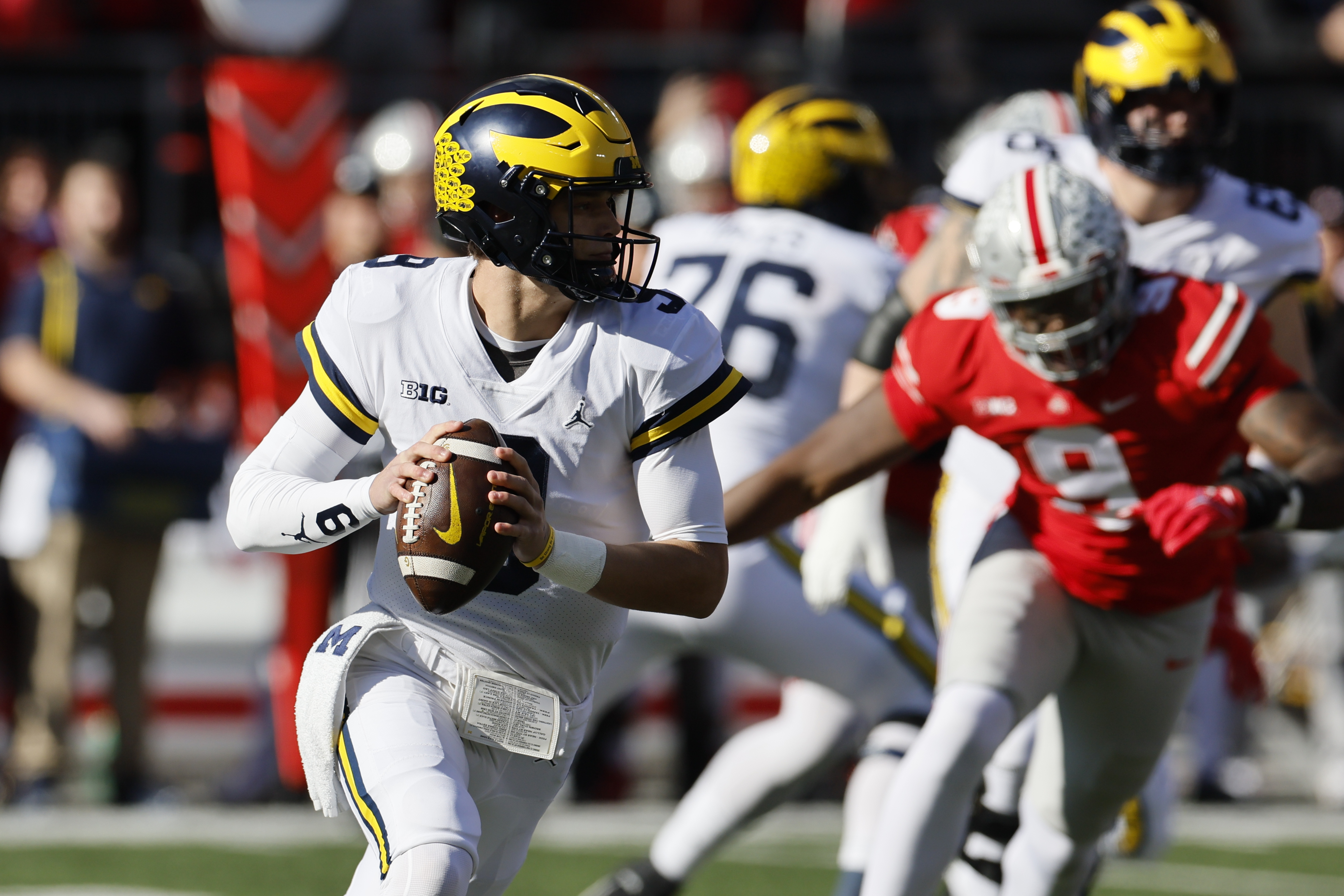 Michigan quarterback J.J. McCarthy drops back to pass against Ohio State during the first half of an NCAA college football game on Saturday, Nov. 26, 2022, in Columbus, Ohio. 