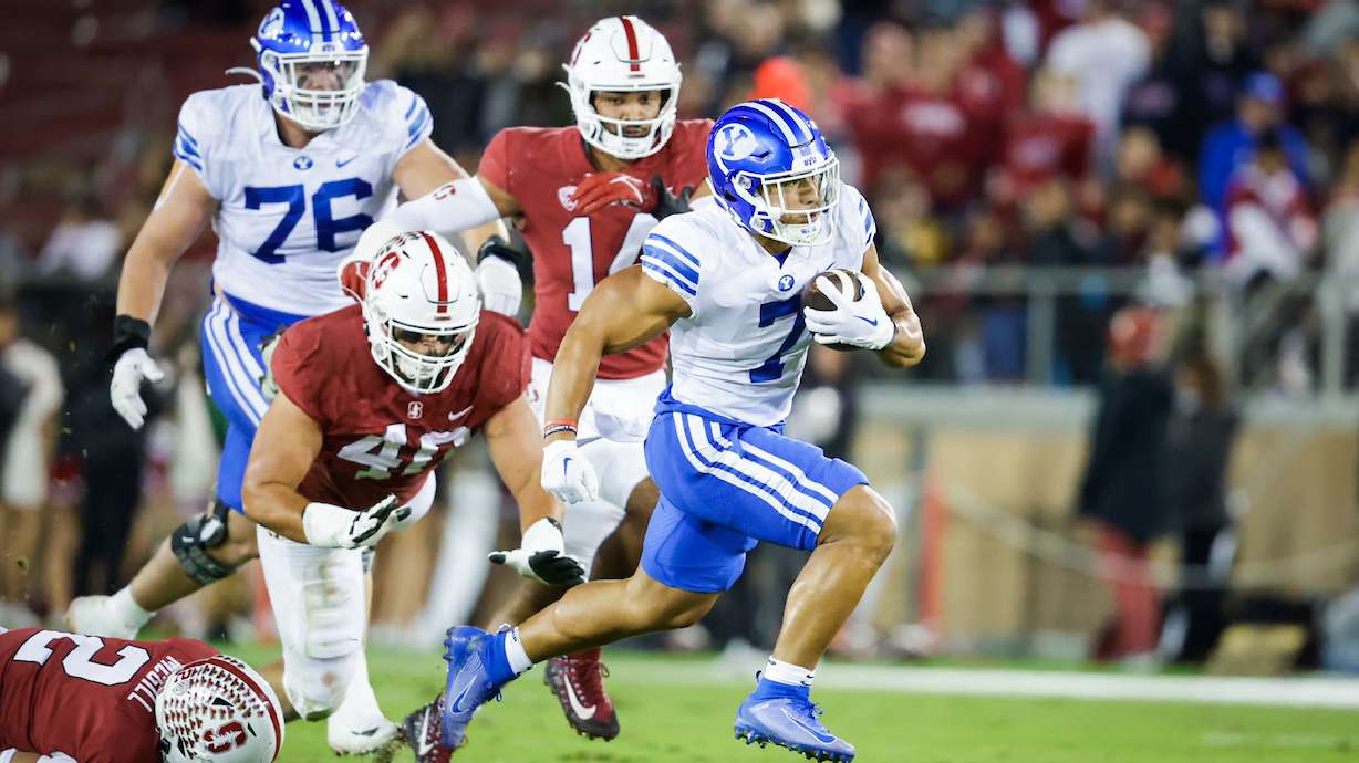 BYU running back Hinckley Ropati runs for a touchdown during the Cougars' game against Stanford, Saturday, Nov. 26, 2022 in Stanford, Calif.