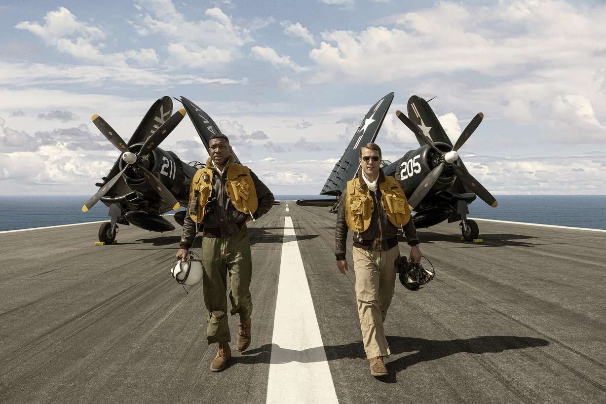 This image released by Sony Pictures shows Jonathan Majors, left, and Glen Powell in a scene from "Devotion."