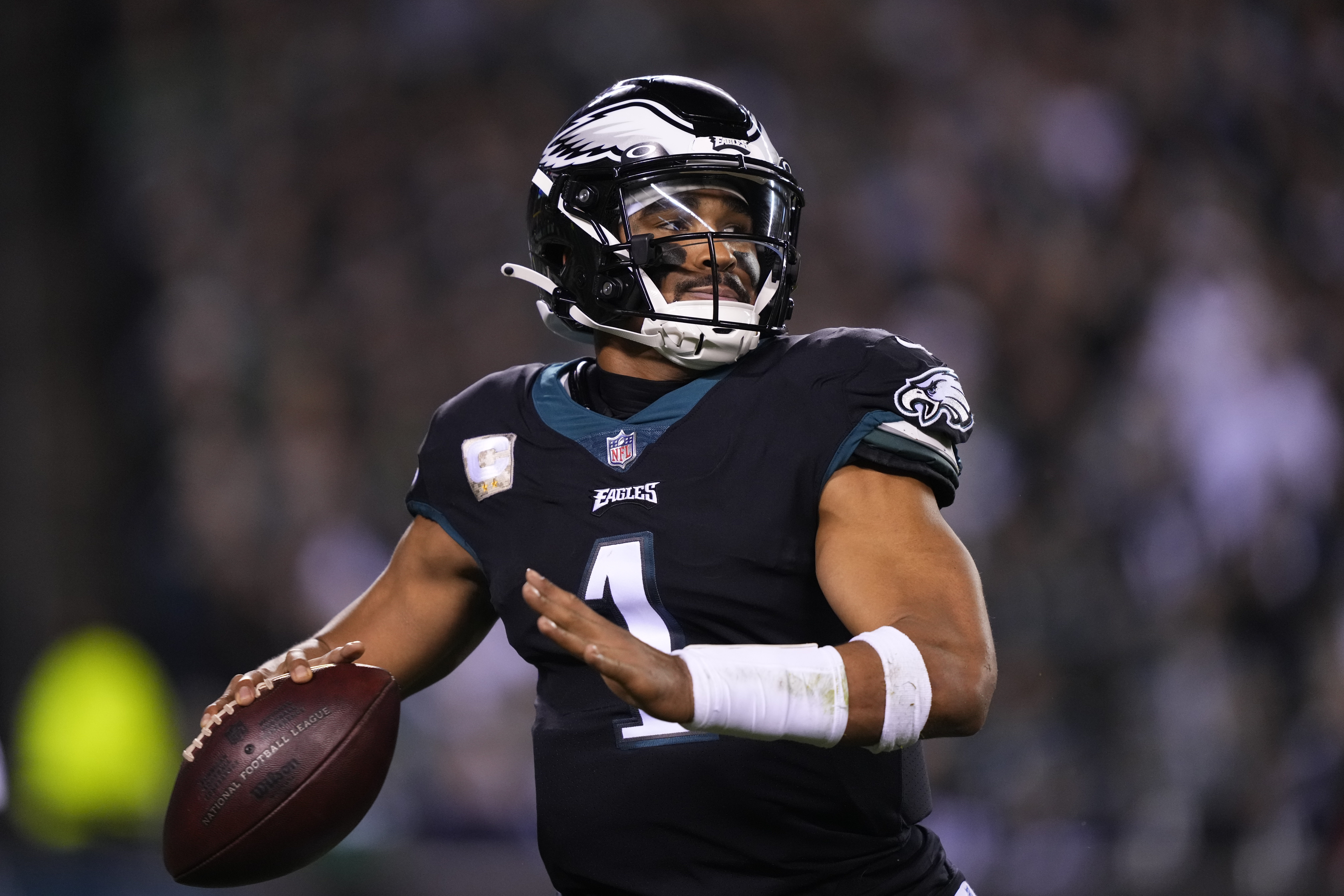 Philadelphia Eagles quarterback Jalen Hurts throws during the first half of an NFL football game against the Green Bay Packers, Sunday, Nov. 27, 2022, in Philadelphia. 