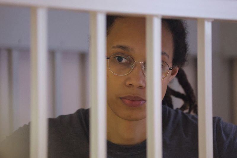 U.S. basketball player Brittney Griner, who was detained at Moscow's Sheremetyevo airport and later charged with illegal possession of cannabis, stands inside a defendants' cage during the reading of the court's verdict in Khimki outside Moscow, Russia Aug. 4. 