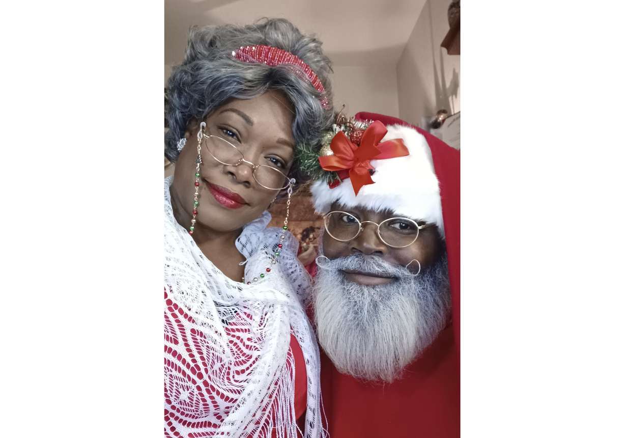 This photo shows Eric Elliott and his wife, Moeisha Elliott, at home in Killeen, Texas, on Oct. 29. The Elliotts have invested in months of professional training to play Santa and Mrs. Claus but said some prospective clients aren’t looking for Black performers.