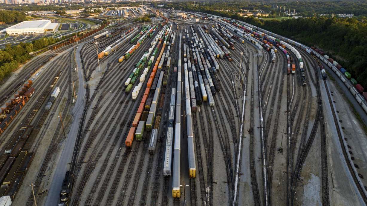 Freight train cars sit in a Norfolk Southern rail yard on Sept. 14, in Atlanta. A coalition of more than 400 business groups sent a letter to congressional leaders Monday urging them to step in because of fears about the devastating potential impact of a strike that could force many businesses to shut down.