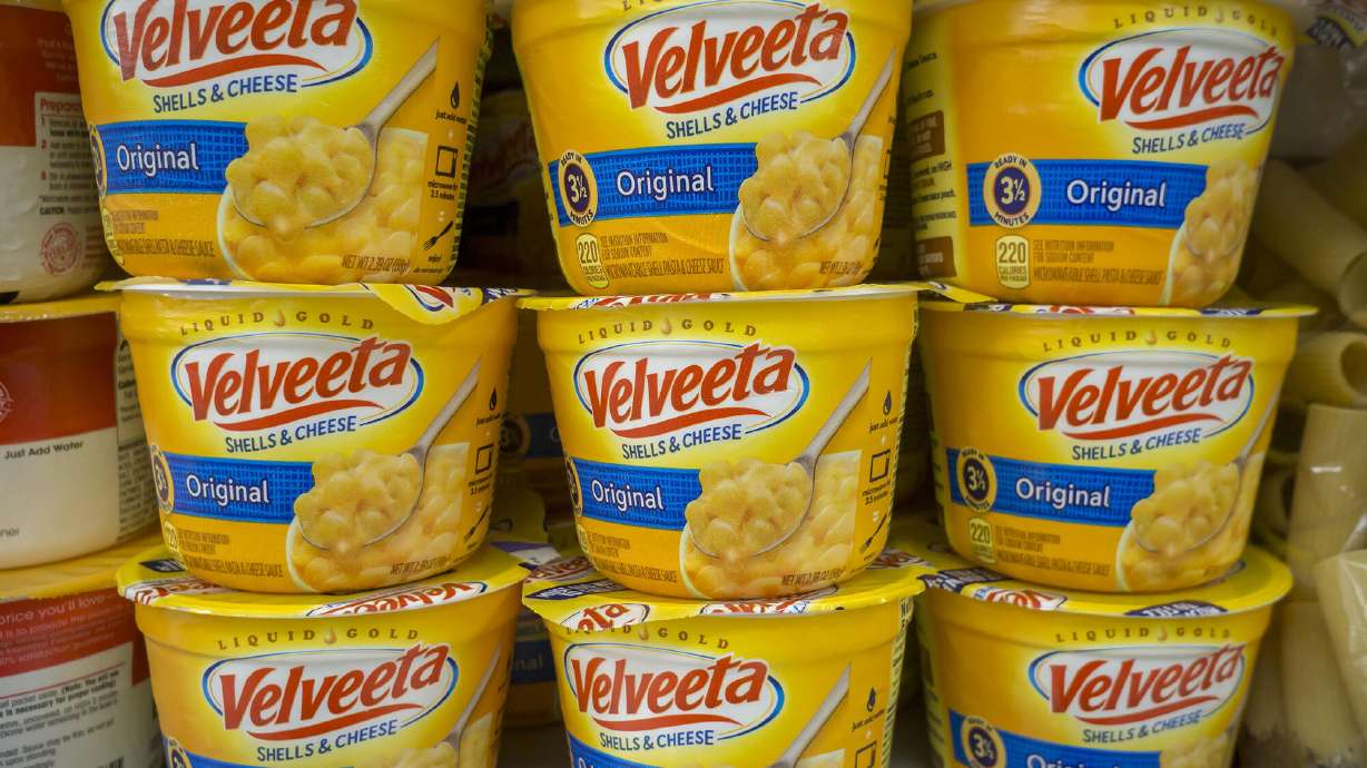 A woman is suing Kraft Heinz Foods for $5 million, saying Velveeta's microwaveable mac and cheese takes longer to make than advertised to prepare.