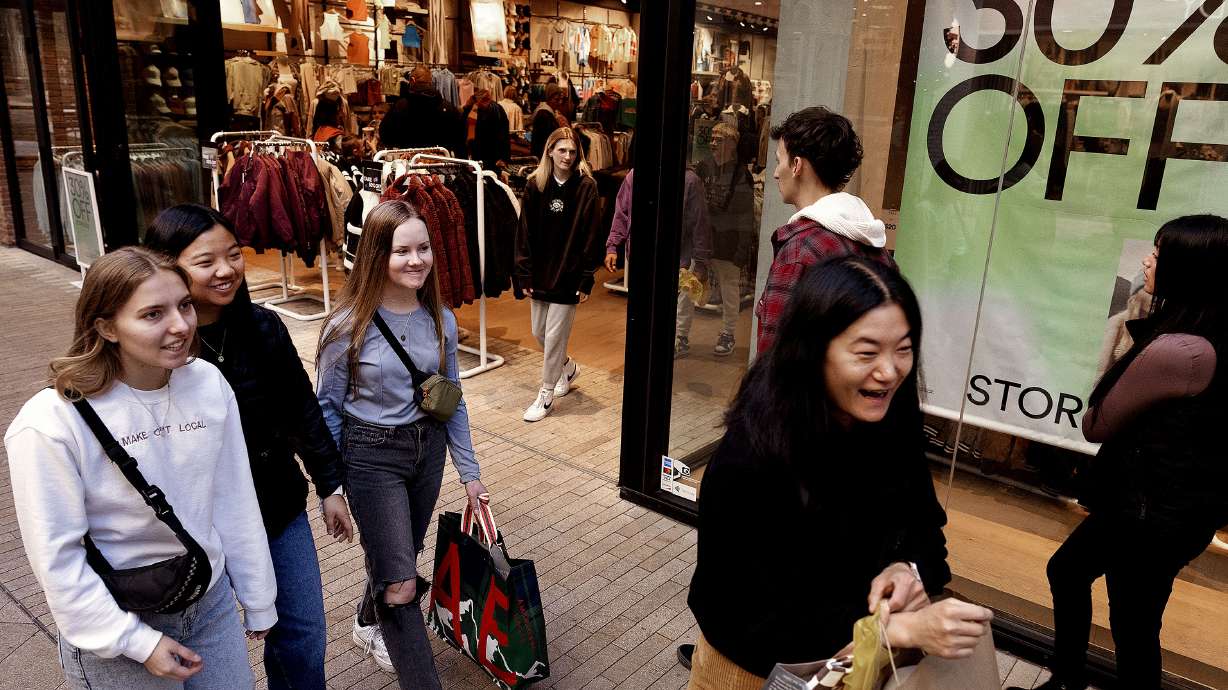Cami Delli Gatti, left; Mercy Fetzer; Liza Barnett; and Elizabeth Fetzer walk through the City Creek Center in Salt Lake City on Black Friday. Despite the stubborn, albeit easing shadow of inflation looming over the U.S. economy, some Salt Lake City shoppers still opted to venture out over the holiday weekend to support businesses local businesses.