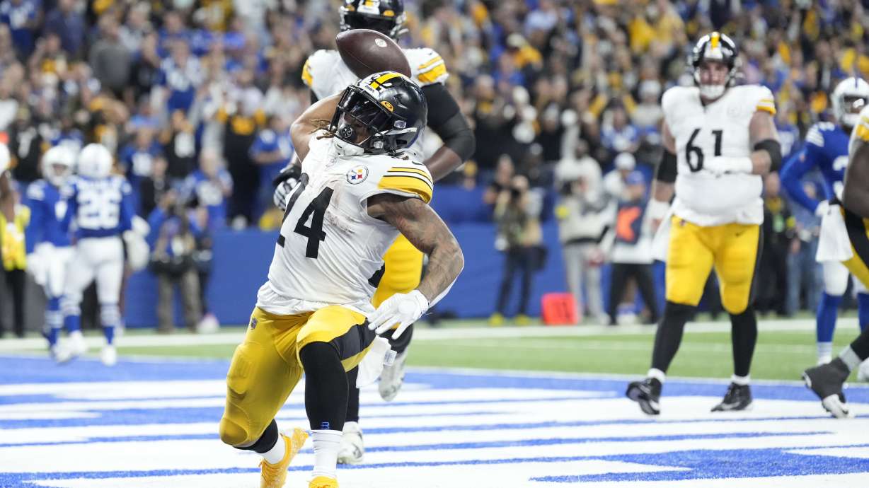 Pittsburgh Steelers running back Benny Snell Jr. (24) celebrates a touchdown run during the second half of an NFL football game against the Indianapolis Colts, Monday, Nov. 28, 2022, in Indianapolis.