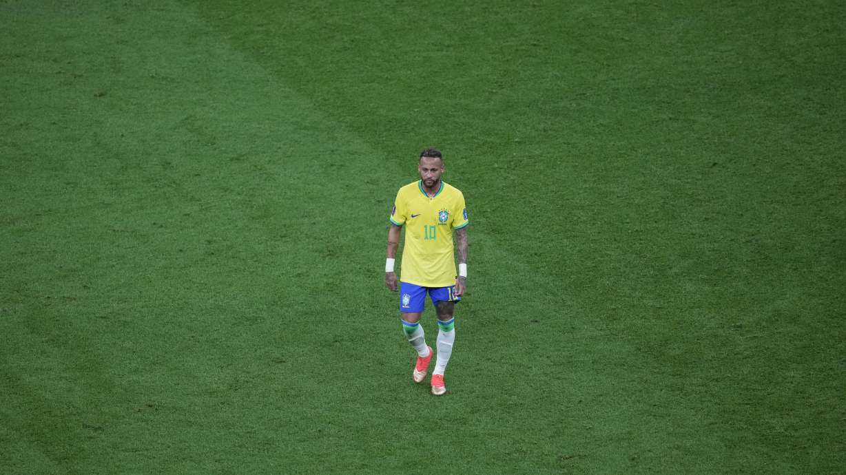 Brazil's Neymar walks on the pitch during the World Cup group G soccer match between Brazil and Serbia, at the the Lusail Stadium in Lusail, Qatar on Thursday, Nov. 24, 2022.