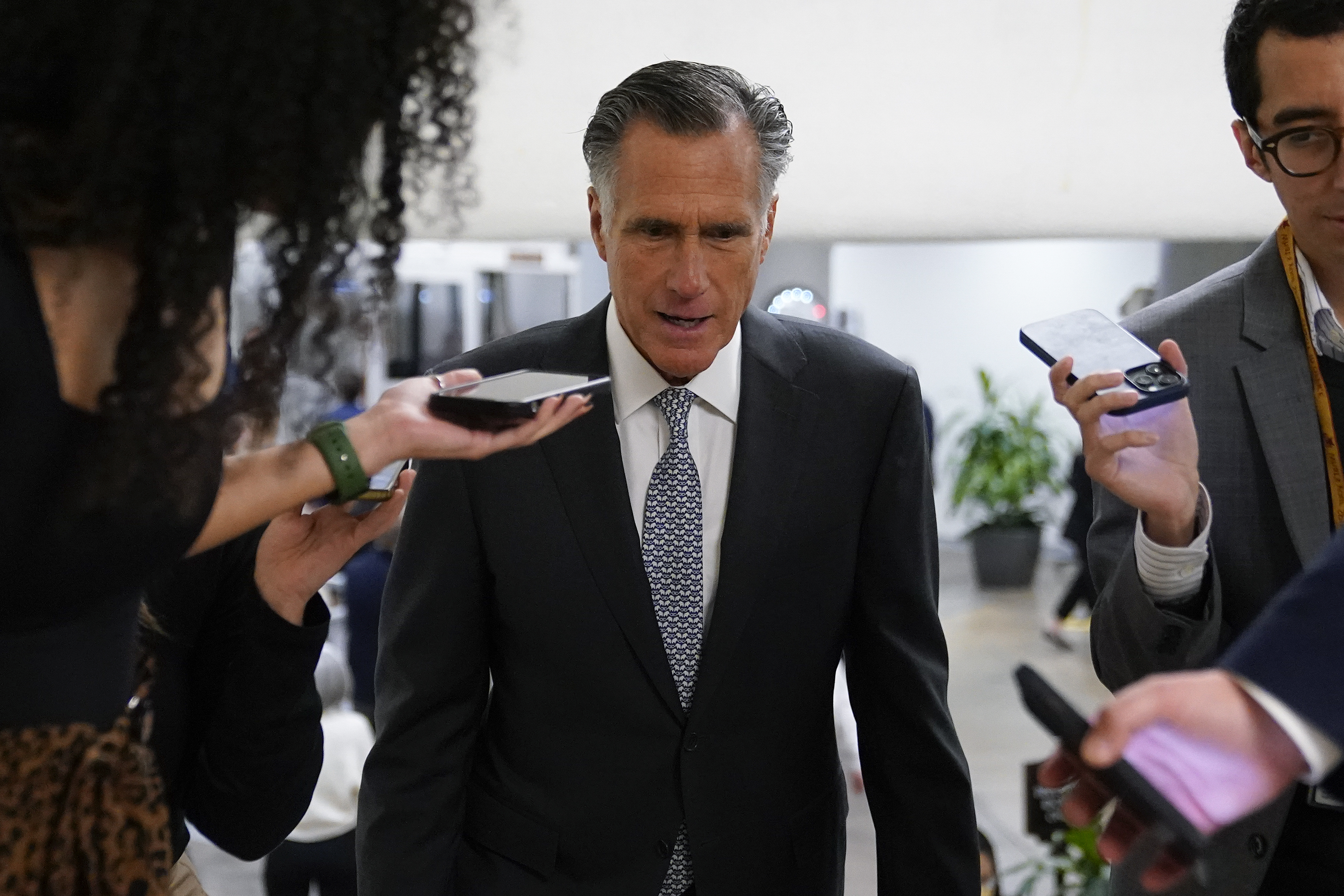 Sen. Mitt Romney, R-Utah, speaks with members of the press Nov. 16, 2022, on Capitol Hill in Washington. Romney's chief of staff confirmed Friday that the senator is not planning to appear on a third-party bid in 2024.