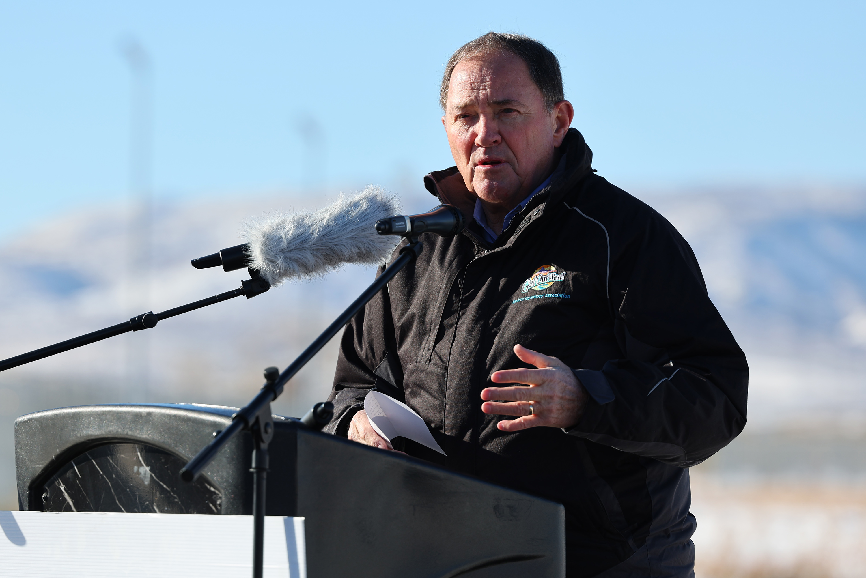 Former Governor of Utah Gary Herbert speaks as crews work to topple one of the guard towers at the old state prison in Draper on Tuesday.