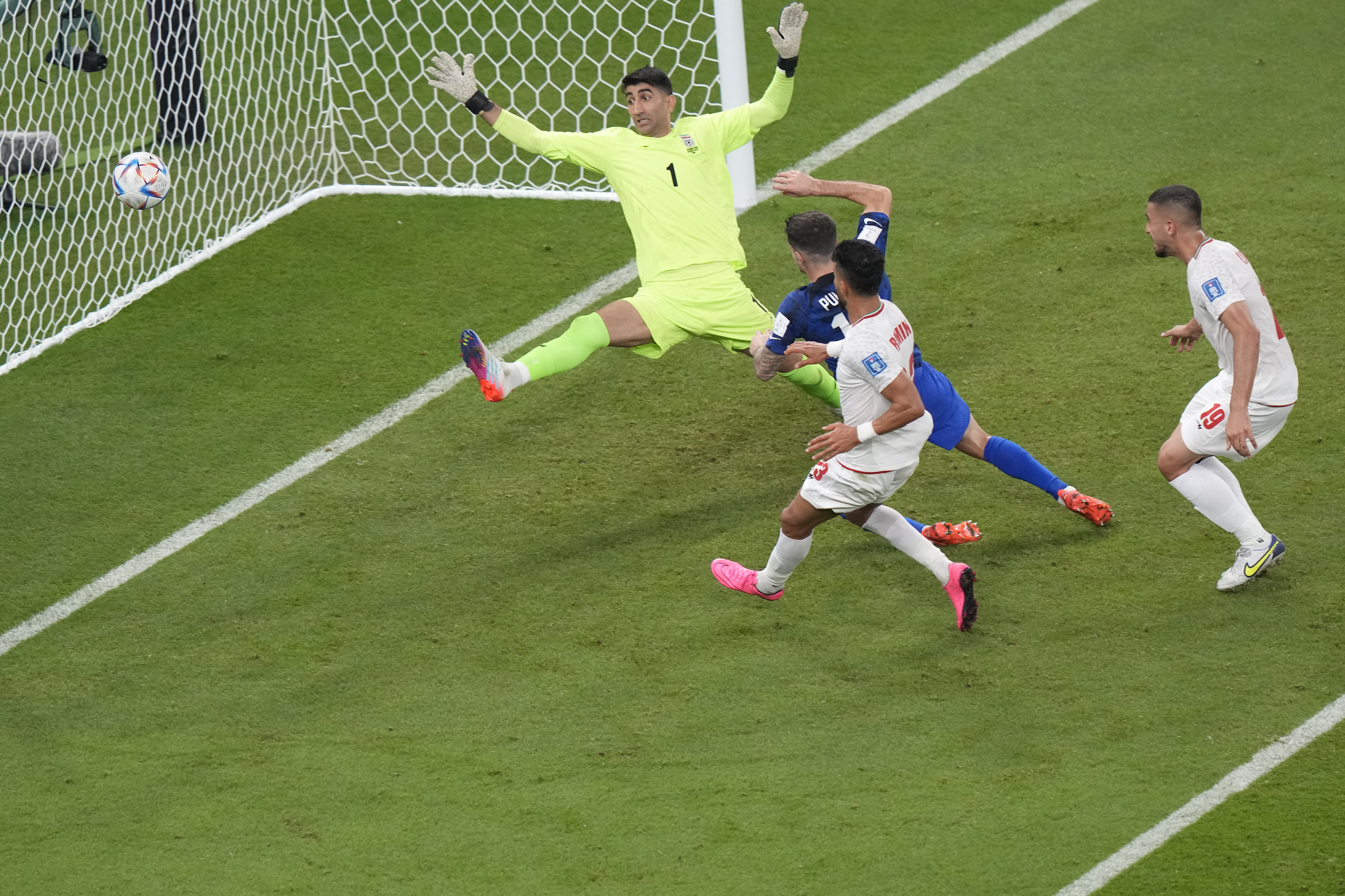 Christian Pulisic of the United States scores his side's opening goal during the World Cup group B soccer match between Iran and the United States at the Al Thumama Stadium in Doha, Qatar, Tuesday, Nov. 29, 2022. 