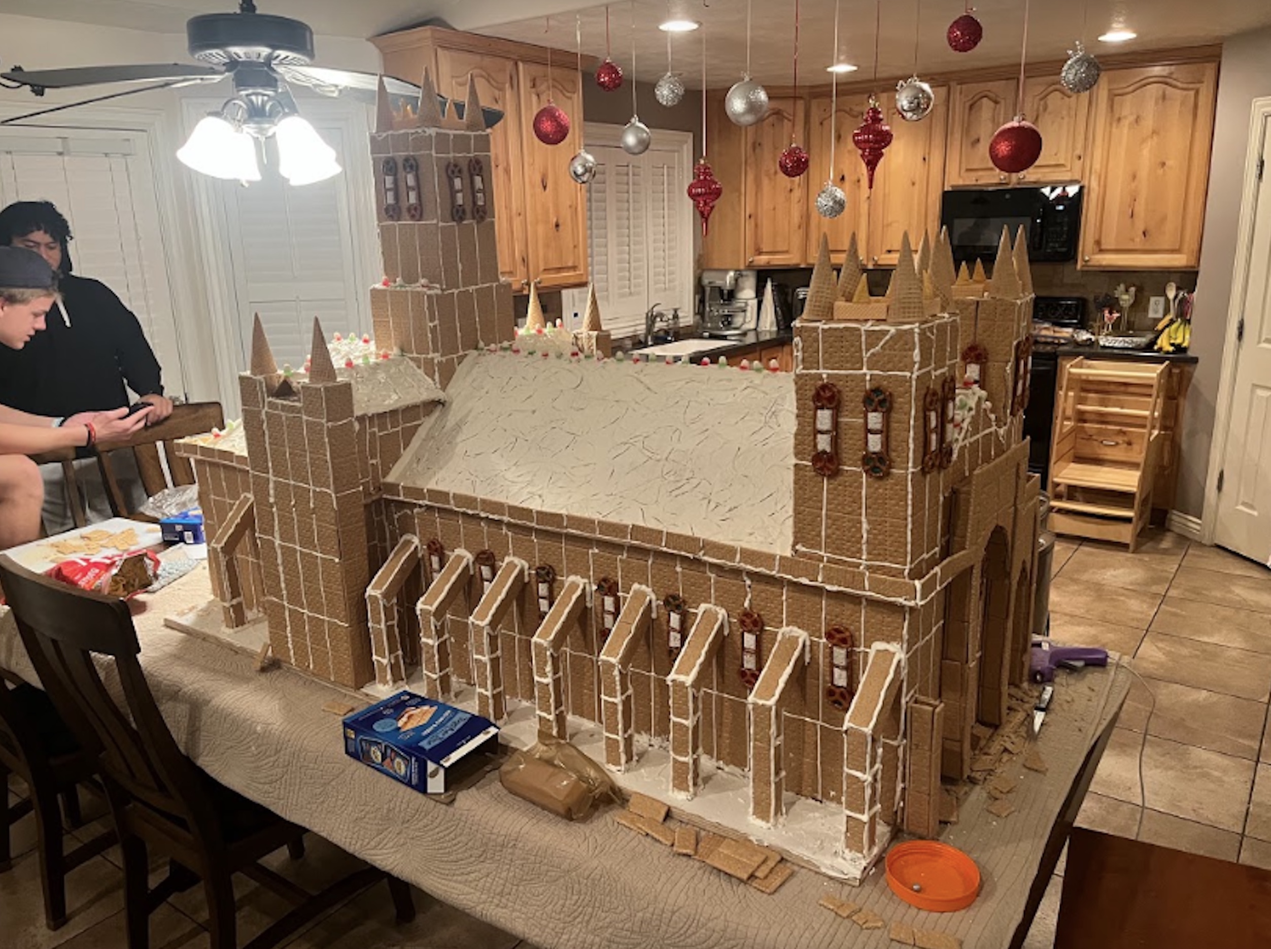 Three teens at Bingham High School made an especially festive gingerbread creation, of towering proportions.